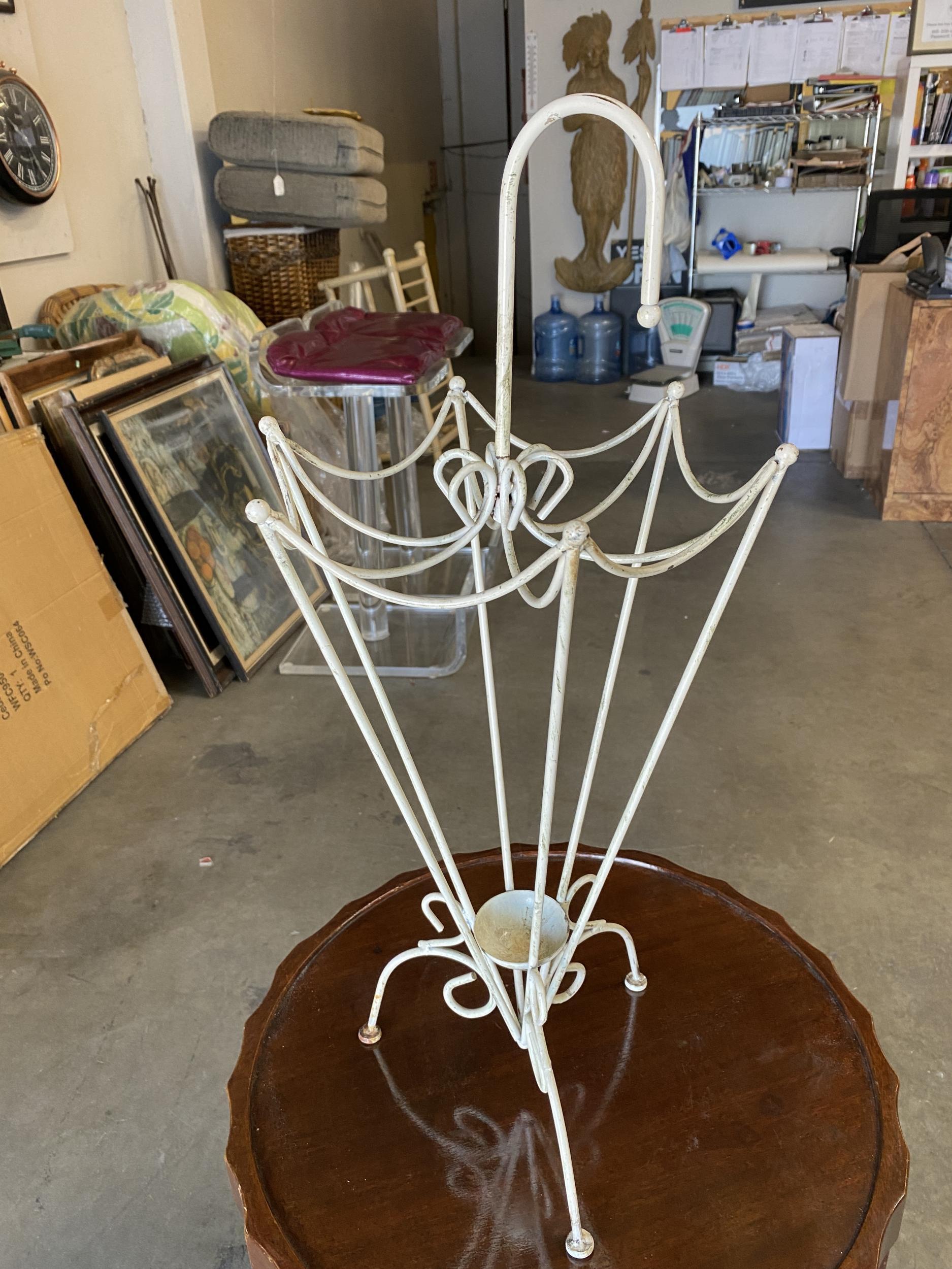 George Nelson inspired iron wire umbrella stand fashioned after the 1948 vitra ball clock designed by Nelson himself.