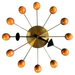 George Nelson Mid Century Ball Clock in Brass and Wood
