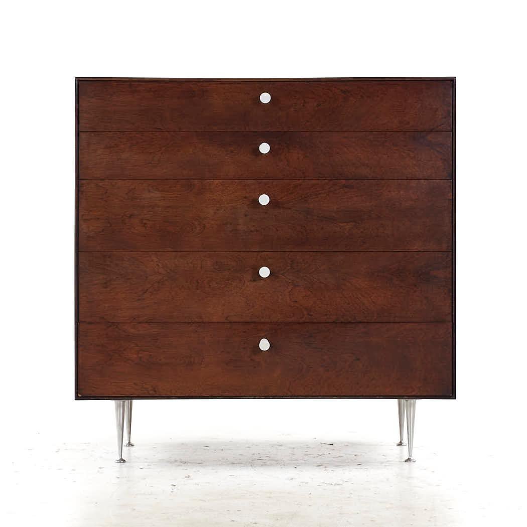 George Nelson Mid Century Rosewood Thin Edge 5 Drawer Chest

This chest of drawers measures: 39.75 wide x 18.5 deep x 40.5 inches high

All pieces of furniture can be had in what we call restored vintage condition. That means the piece is restored