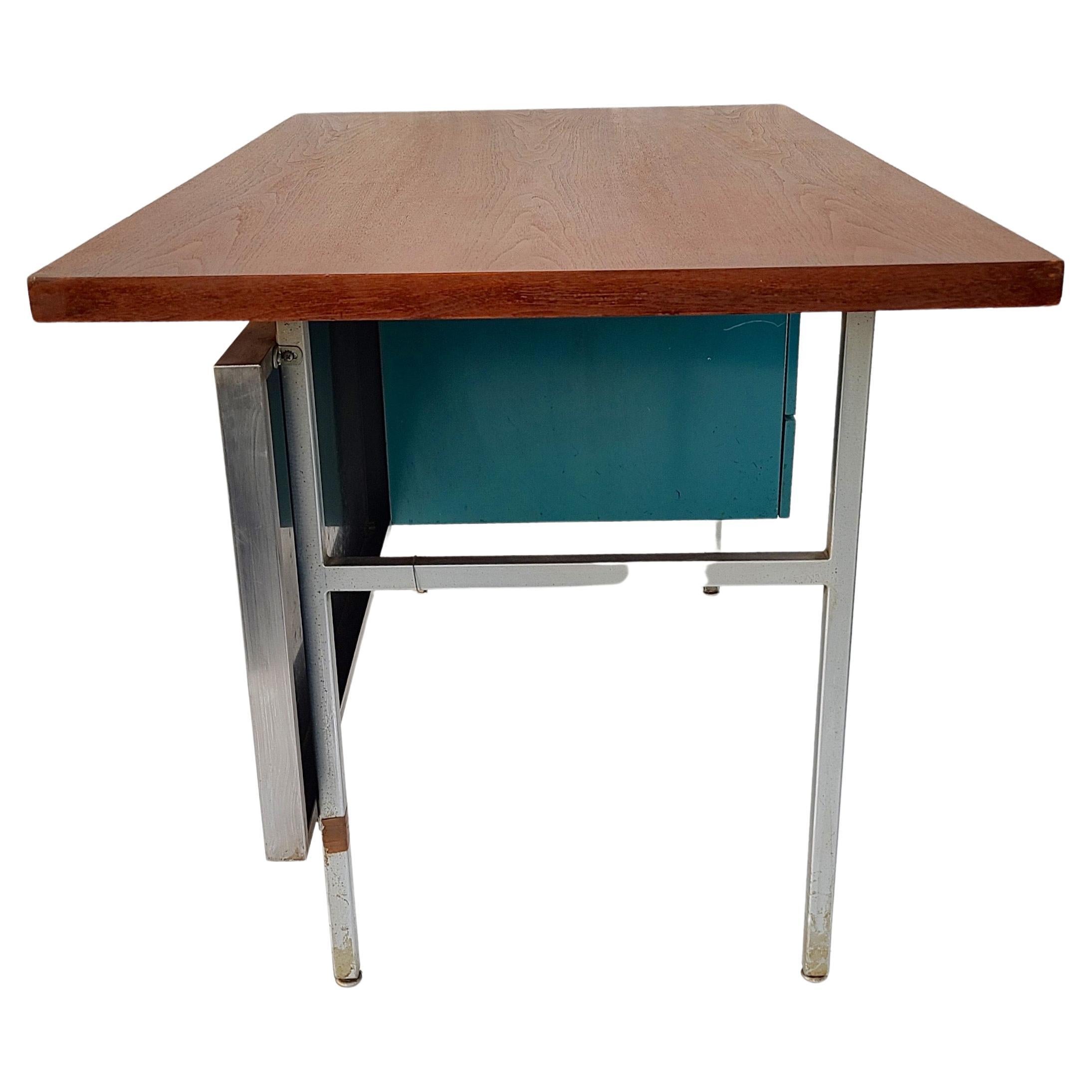 MMG Desk designed by George Nelson for Herman Miller.

Some collectors of George Nelson designs prefer some original condition.
This desk is a combination. The top has been refinished to remove some stains.
The approach we use is minimally