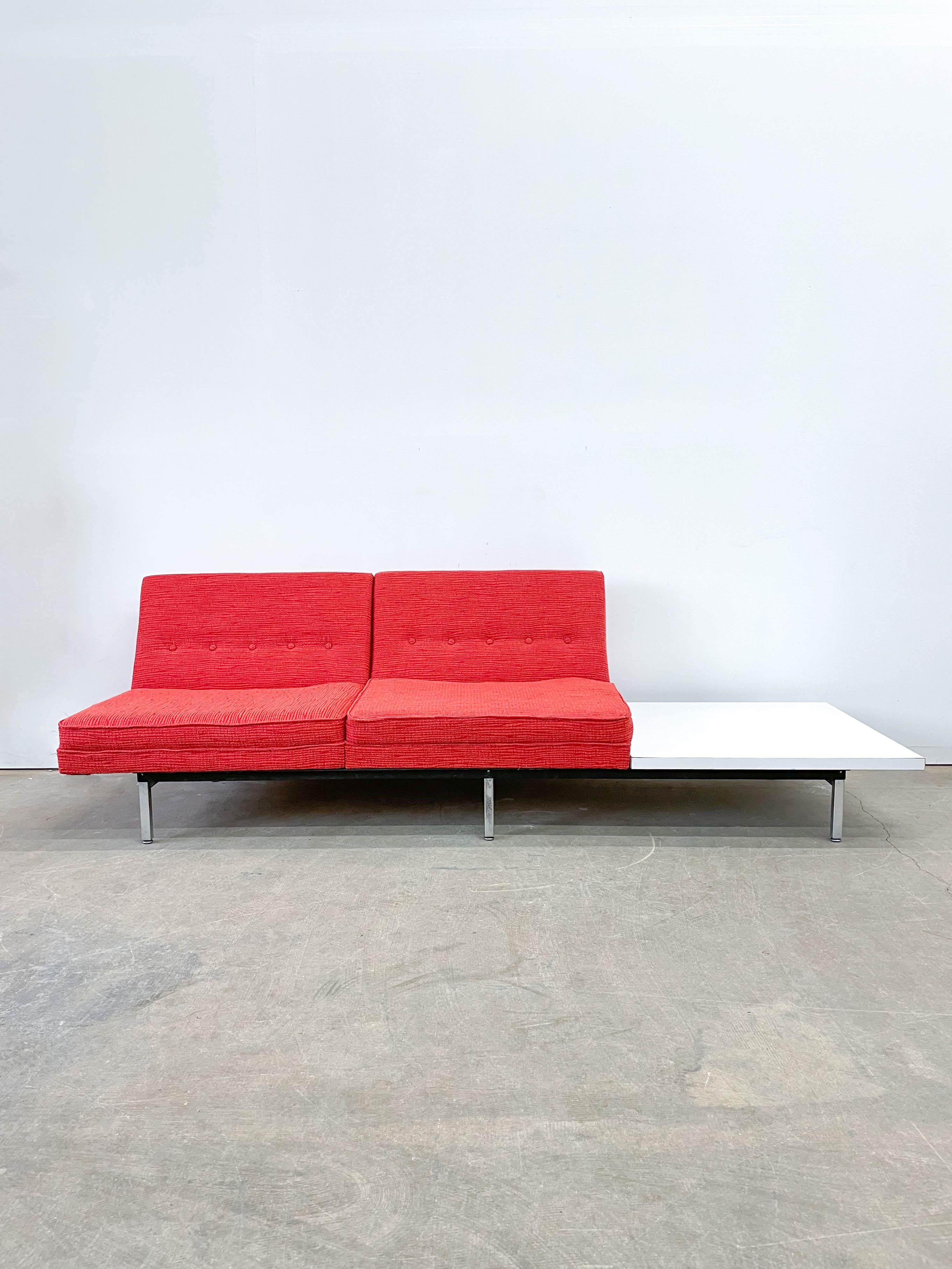 This is the ultimate modular pieces for your Mid-Century Modern living room! This sleek modular sofa was designed by George Nelson and Associates in the 1950s and made by Herman Miller. The two chair pieces and the table section can be rearranged as