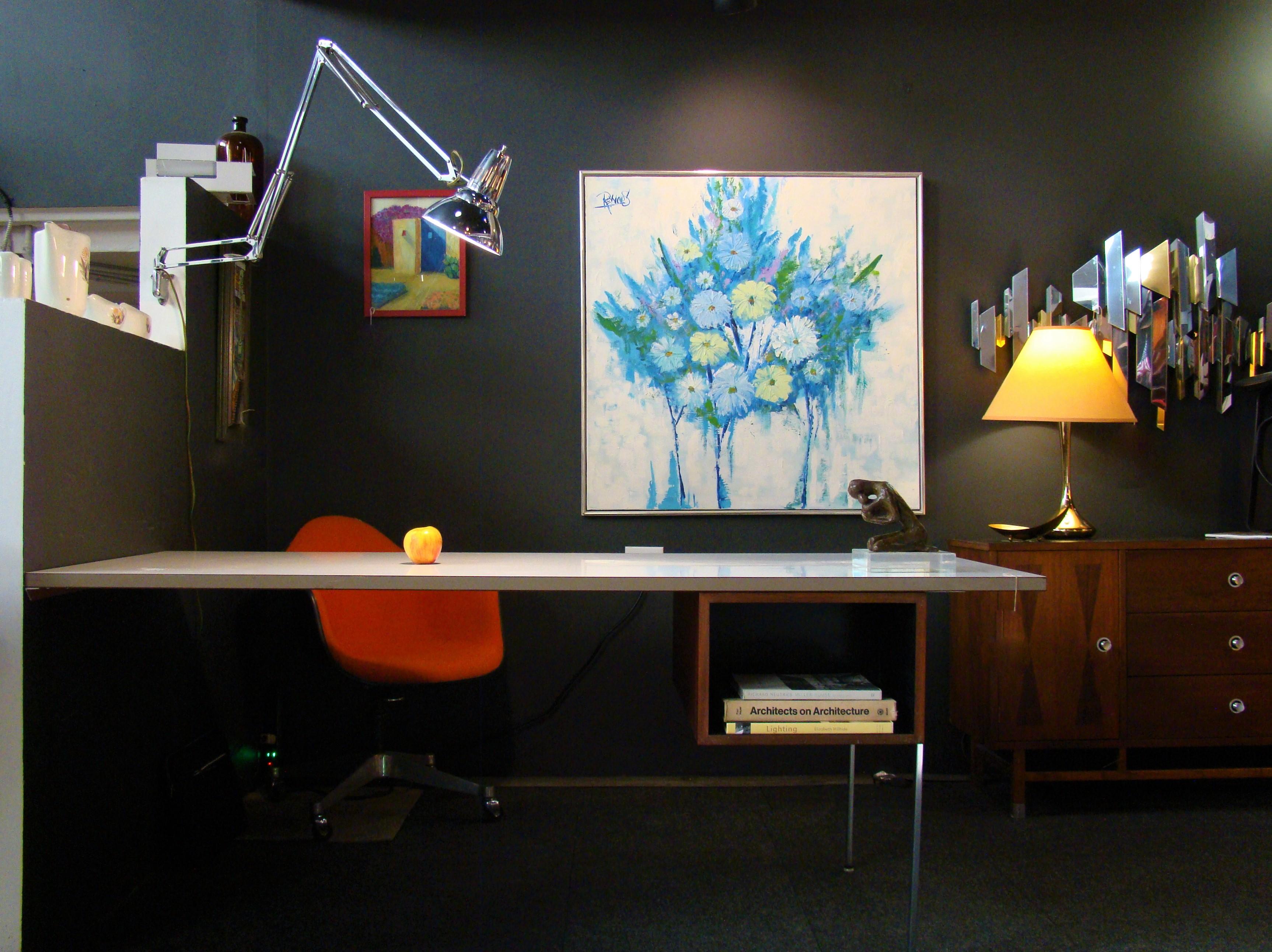 Desk element designed by George Nelson. Originally offered as an option to the OMNI wall unit (circa 1960s), the desk is constructed of walnut and chrome steel with a stunning 