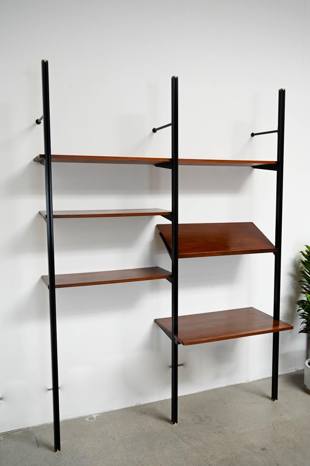 George Nelson OMNI Walnut Wall Unit, ca. 1960.  Beautiful original early OMNI walnut and aluminum wall unit by George Nelson for Herman Miller.  Original shelving with 3 shelves, one magazine rack and one larger desk.  Includes wall mounting