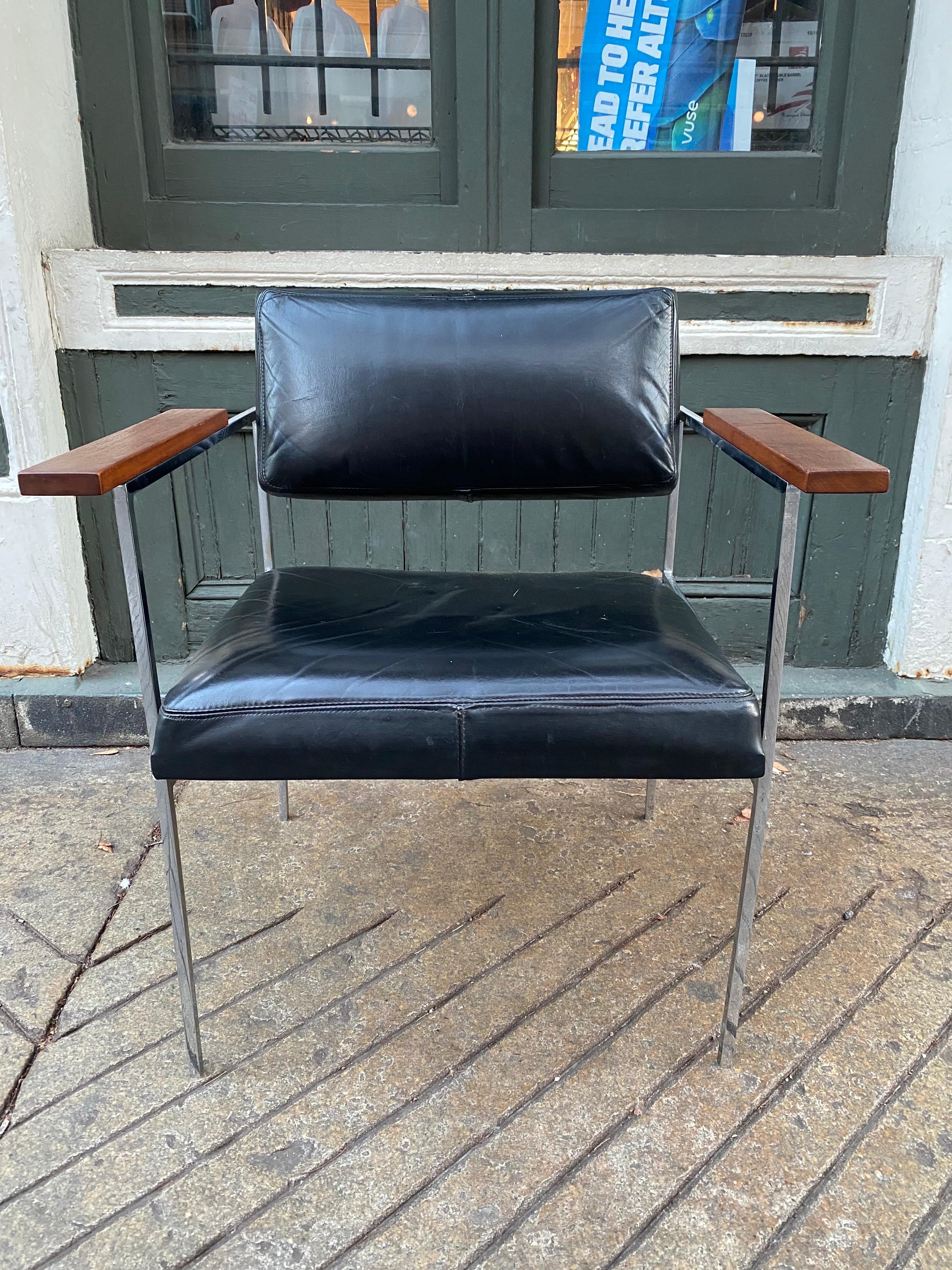 Elegant lines and comfortable occasional chair. Beautiful vintage, completely original, early version of this scarce chair designed by George Nelson for Herman Miller. The chrome is in excellent condition with original black Leather Upholstery!