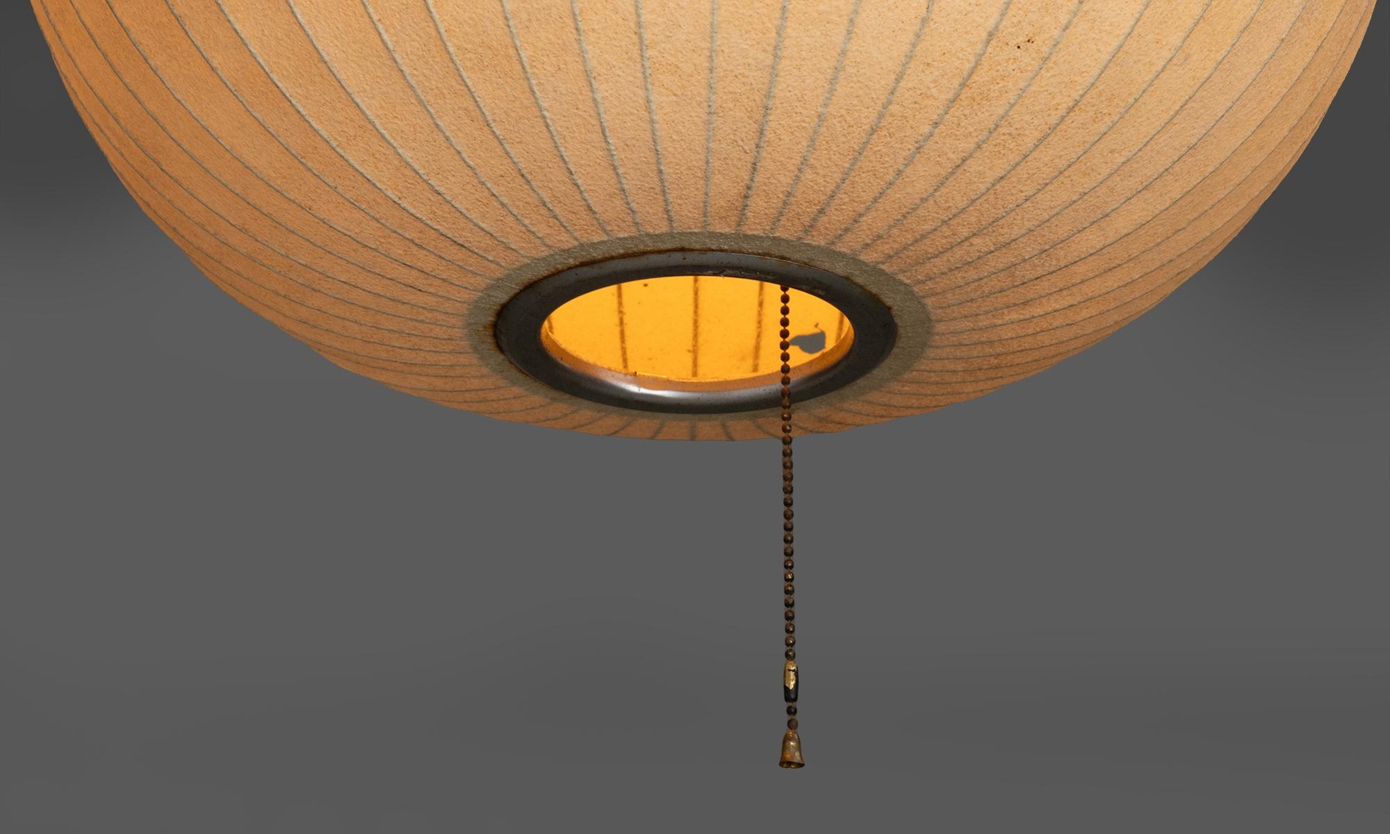 America circa 1950
Resin shade on metal ribbed globe form. Made for Howard Miller. see images for shade damage.
18