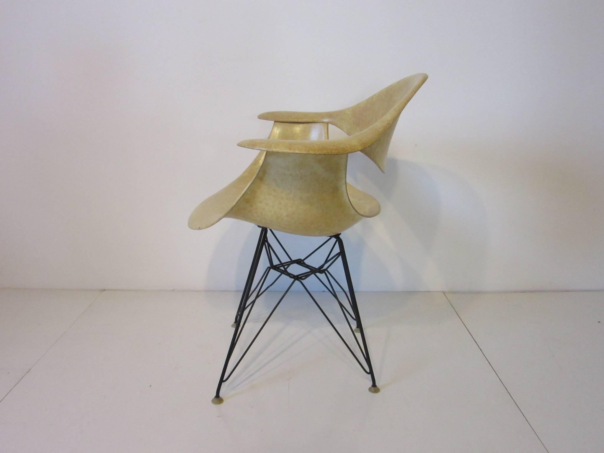 An early per production prototype fiberglass arm shell or DAF chair designed by George Nelson. This chair came directly from a engineer working for the Herman Miller company in Zeeland Michigan purchased by a collector of important midcentury