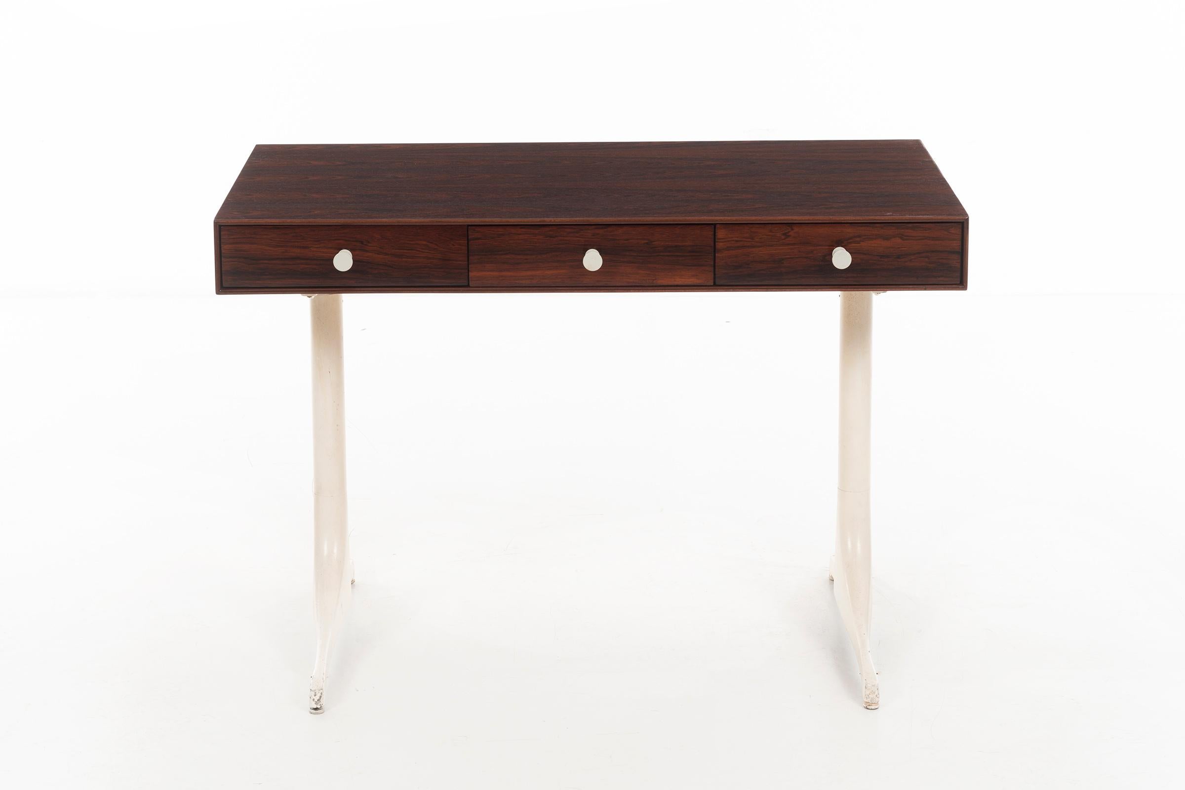 Nelson for Herman Miller, three-drawer desk, model 5494. Deep figured rosewood graining with porcelain pulls and 