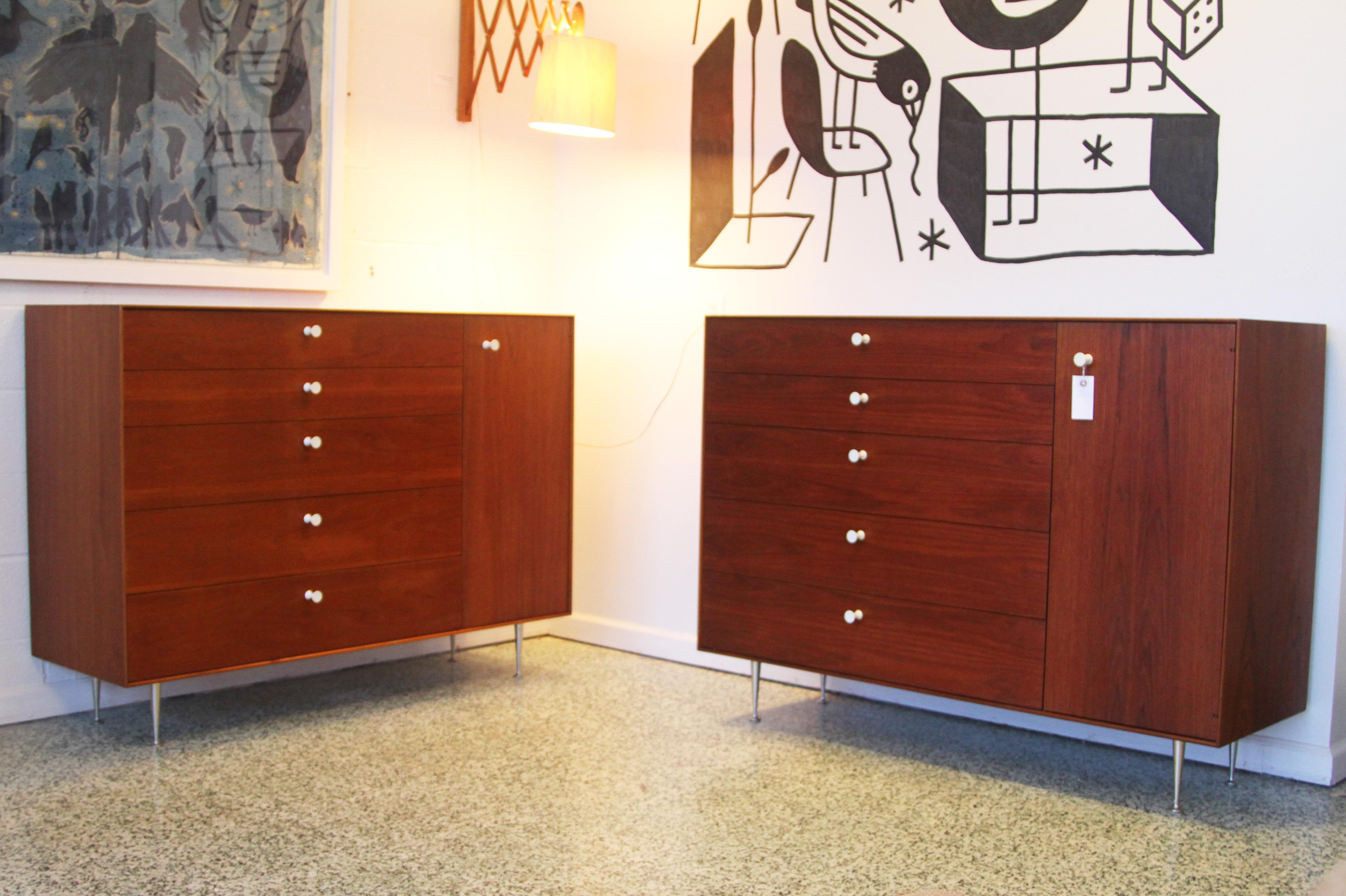 Designer: George Nelson 
Manufacture: Herman Miller 
Period/style: Mid-Century Modern 
Country: USA Date: 1950s

We were told from the original owner these chests are prototypes due to the second drawer being smaller than the first. The