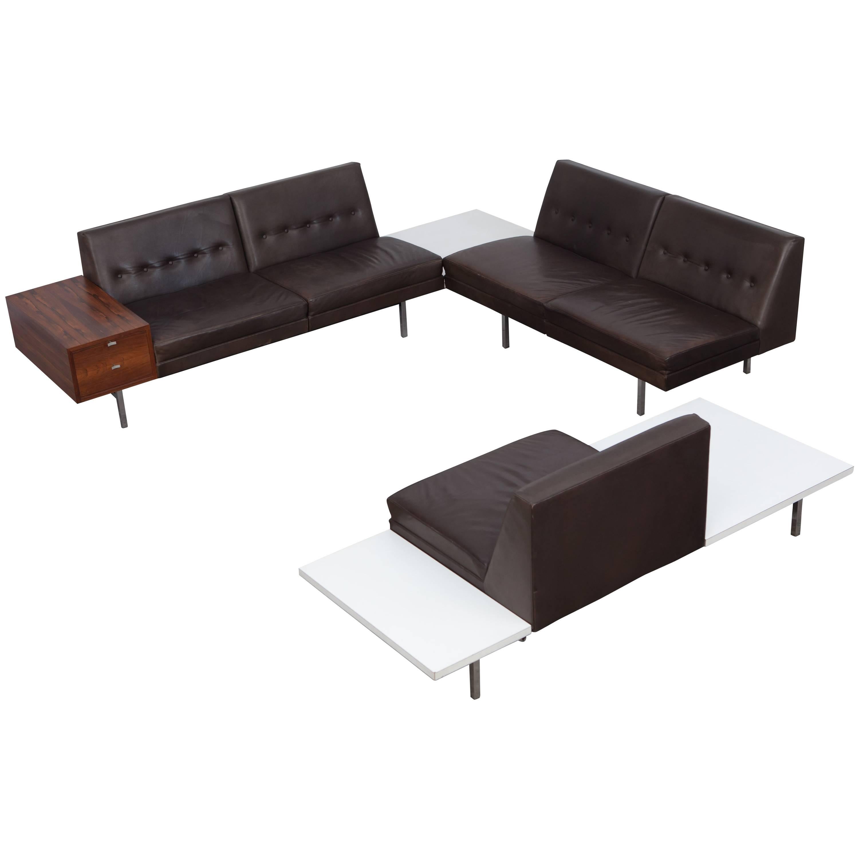 Mid-Century Modern Mad Men style modular system sofa designed by US George Nelson in the 1950s
for Herman Miller.

Dark brown leather seating of the best possible quality is used, mounted on a typical chromed steel adjustable frame. Three white