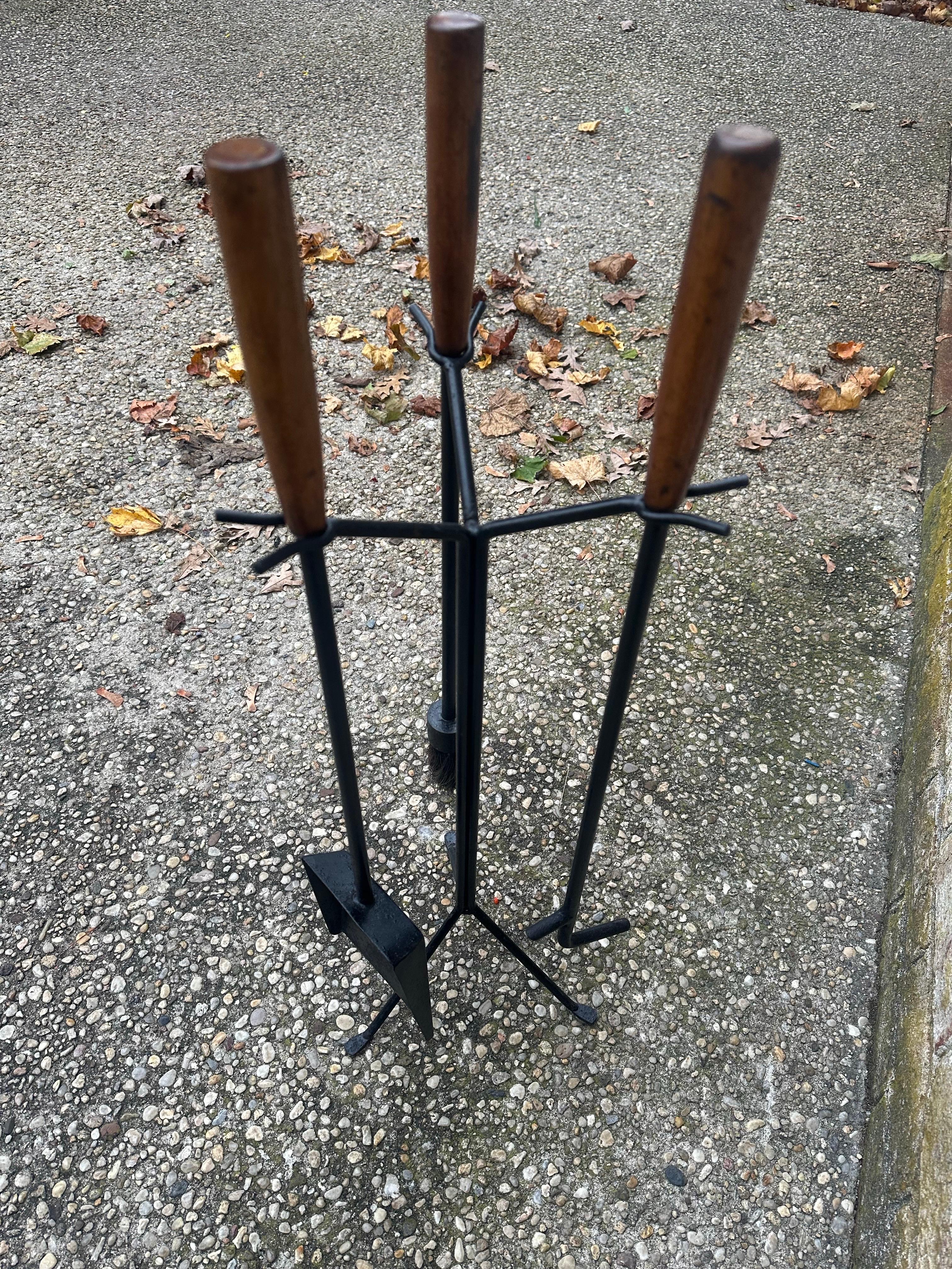 Modern set of fireplace tools by George Nelson.