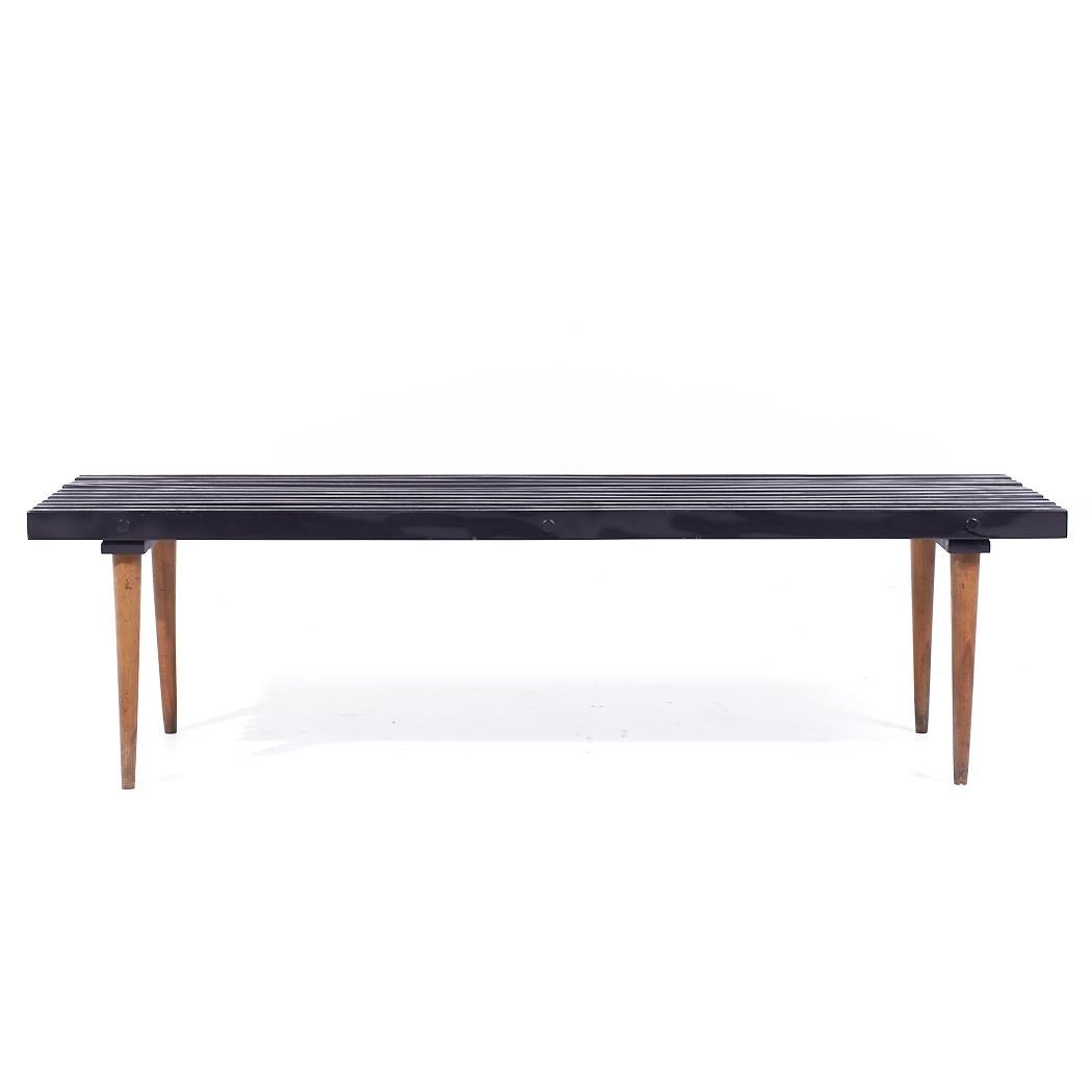 Banc à lattes noires du milieu du siècle dernier de style George Nelson

Ce banc mesure : 60 de large x 17 de profondeur x 16,5 de hauteur

Tous les meubles peuvent être achetés dans ce que nous appelons un état vintage restauré. Cela signifie que