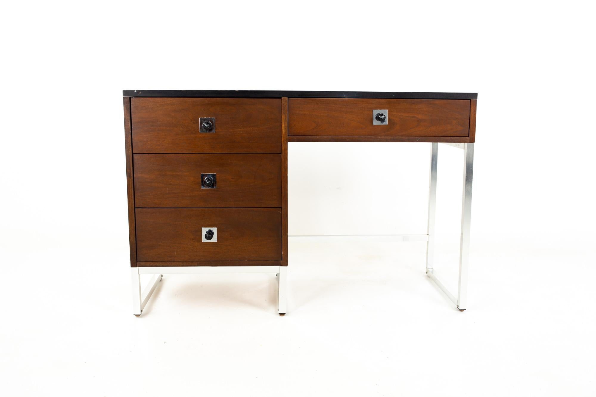 George Nelson style Thomasville Mid Century walnut chrome and black Formica desk
Desk measures: 46.25 wide x 18 deep x 30.25 inches high

This price includes getting this piece in what we call restored vintage condition. That means the piece is