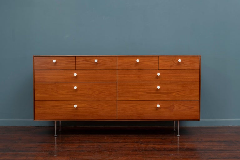 George Nelson thin Edge series double dresser for Herman Miller. Newly refinished 10 drawer teak dresser with porcelain pulls on tapered aluminum legs. This is the rarest and most desirable form from the series designed for two people or one