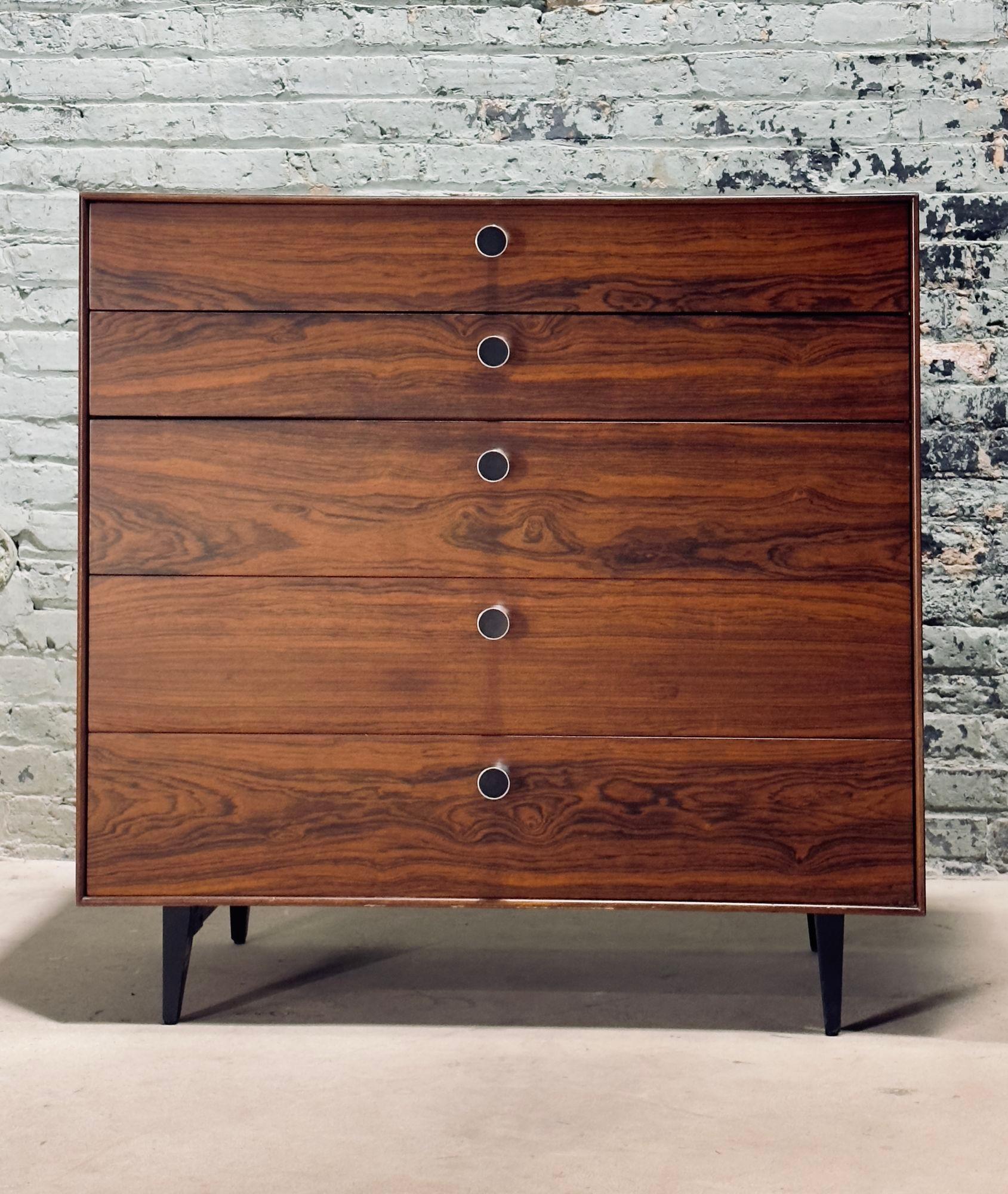 George Nelson thin edge for Herman Miller Rosewood 5 drawer Dresser, 1950. Restored and absolutely beautiful.
The other dresser and pair nightstands is sold in separate listing.
Measure 39.5