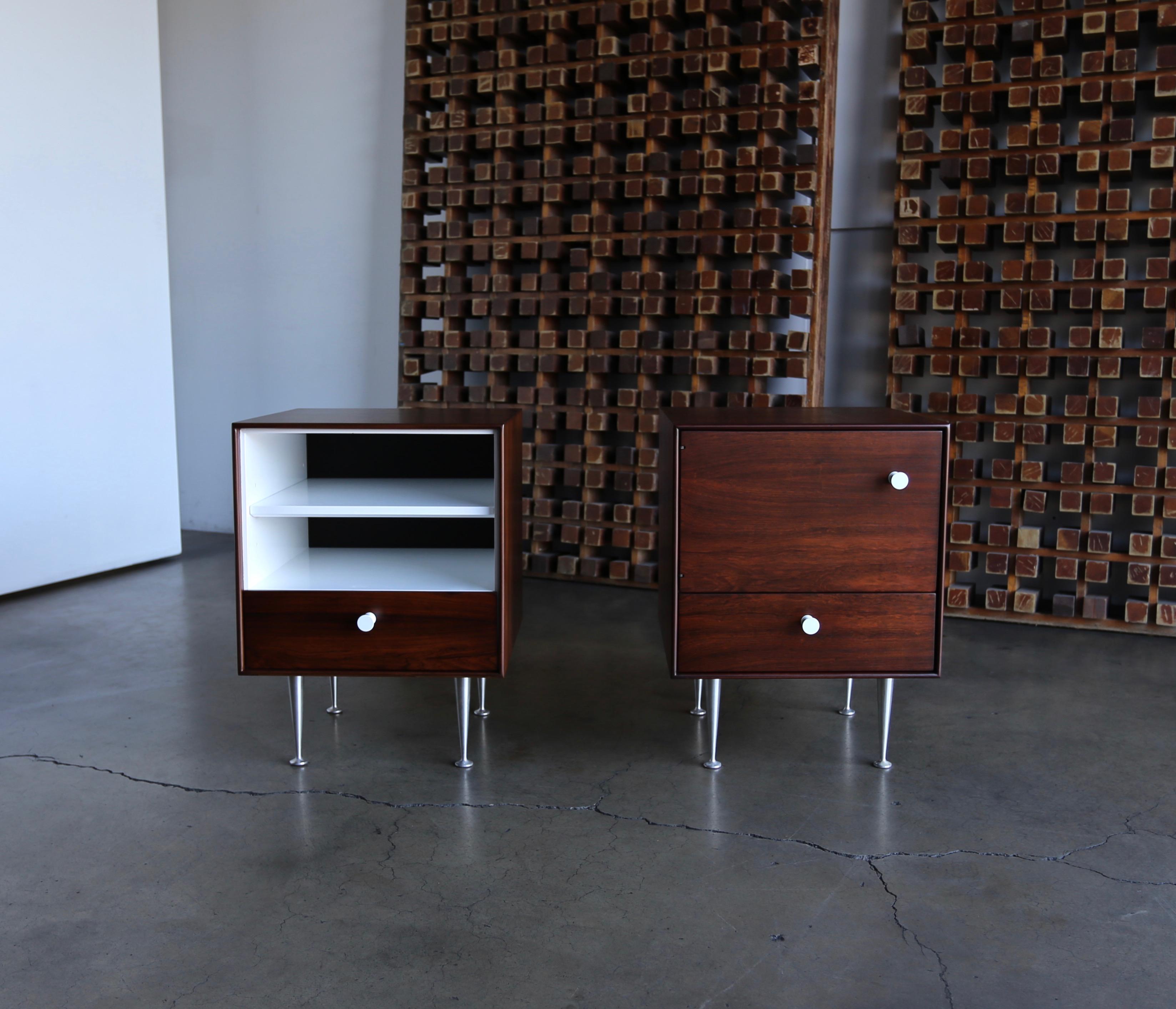 George Nelson & Associates thin edge rosewood nightstands for Herman Miller, circa 1952. This pair has been professionally restored.