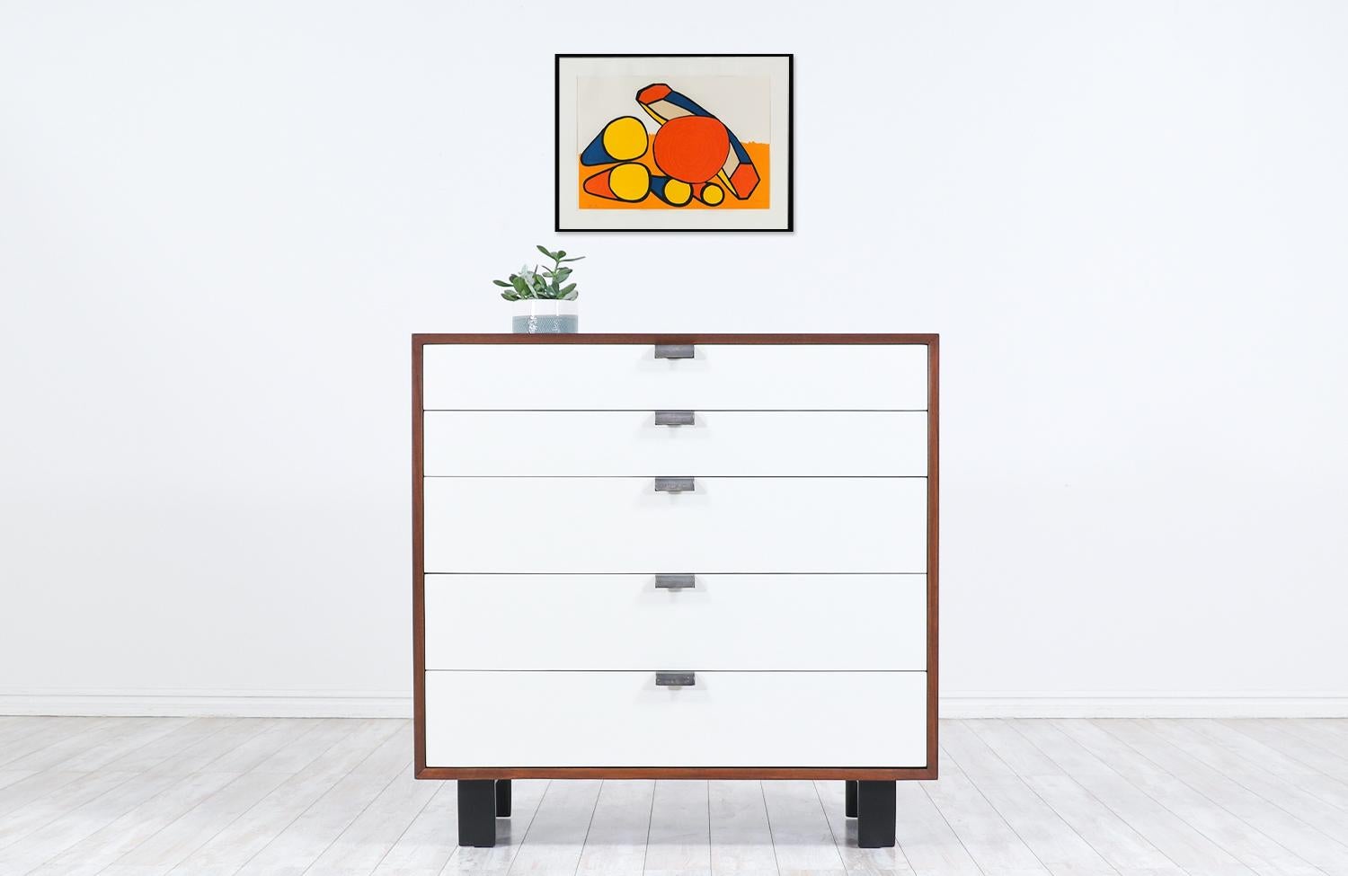 George Nelson two-tone lacquered and walnut chest of drawers for Herman Miller.