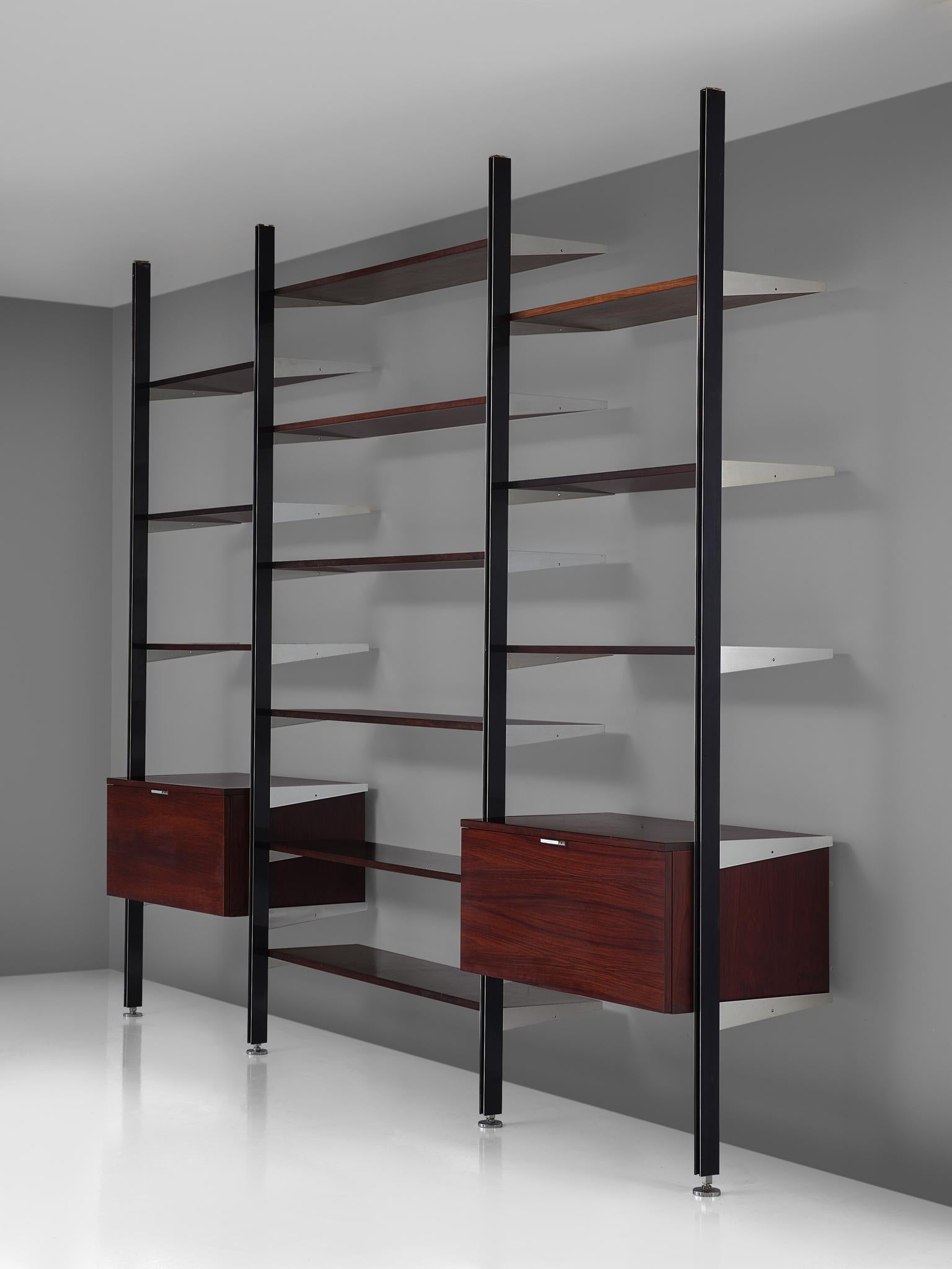 George Nelson for Mobilier International, 'CSS' wall unit, steel, rosewood and aluminum, United States, 1960s

This storage system is designed by Nelson in the 1960s. The wall unit was the first piece of furniture by Miller that made of use of