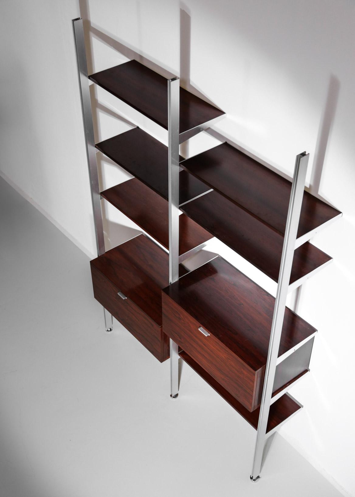 Shelving unit or bookcases by George Nelson for Mobilier International.
Shelves and boxes can be installed at your own convenience.
 