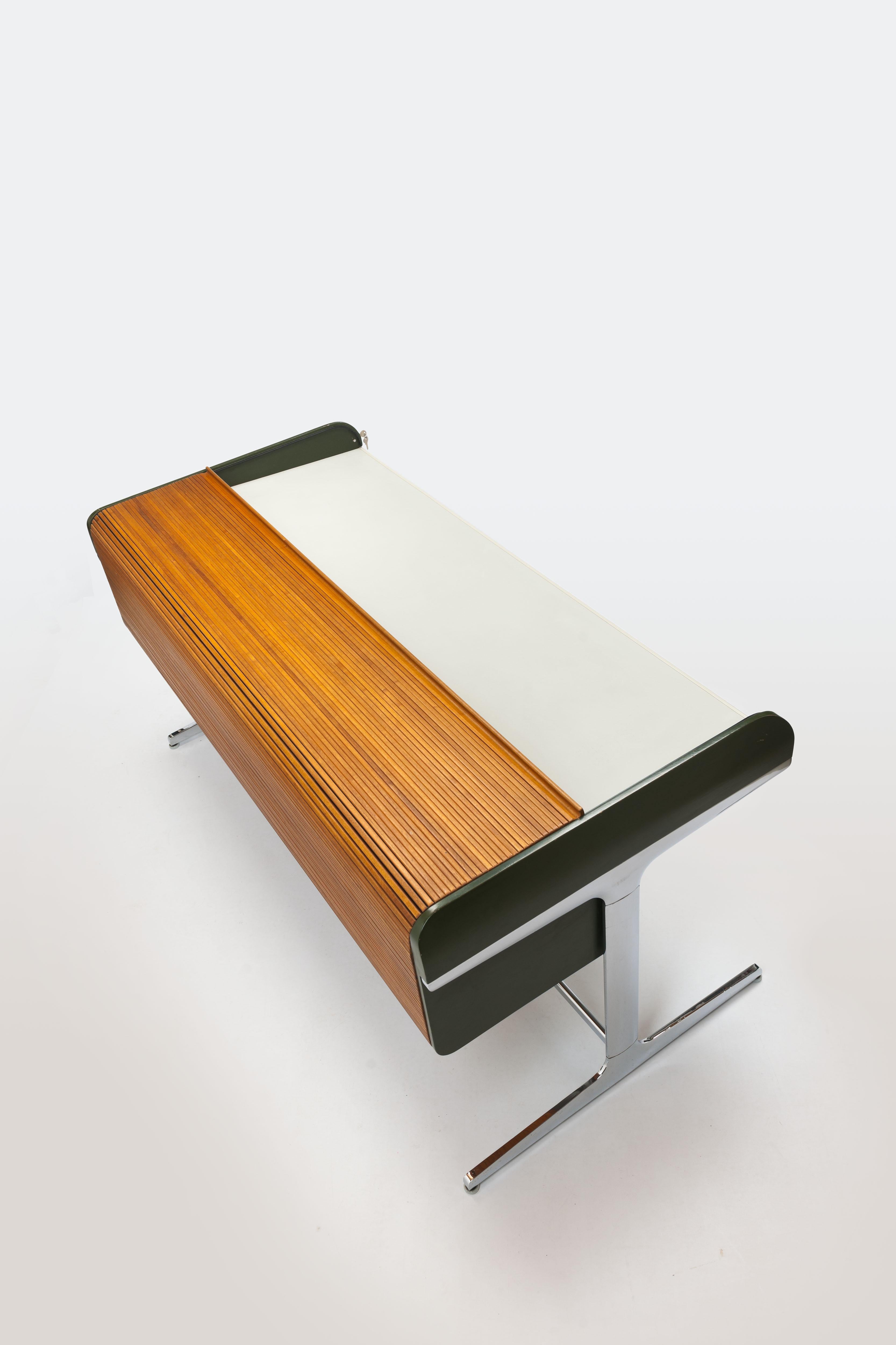 Solid walnut first edition 1964 'Action Office' desk by George Nelson for Herman Miller. 

This is the largest size desk that was available from the program. 
The desk is executed with a solid walnut tambour roll top that slides away and reveals