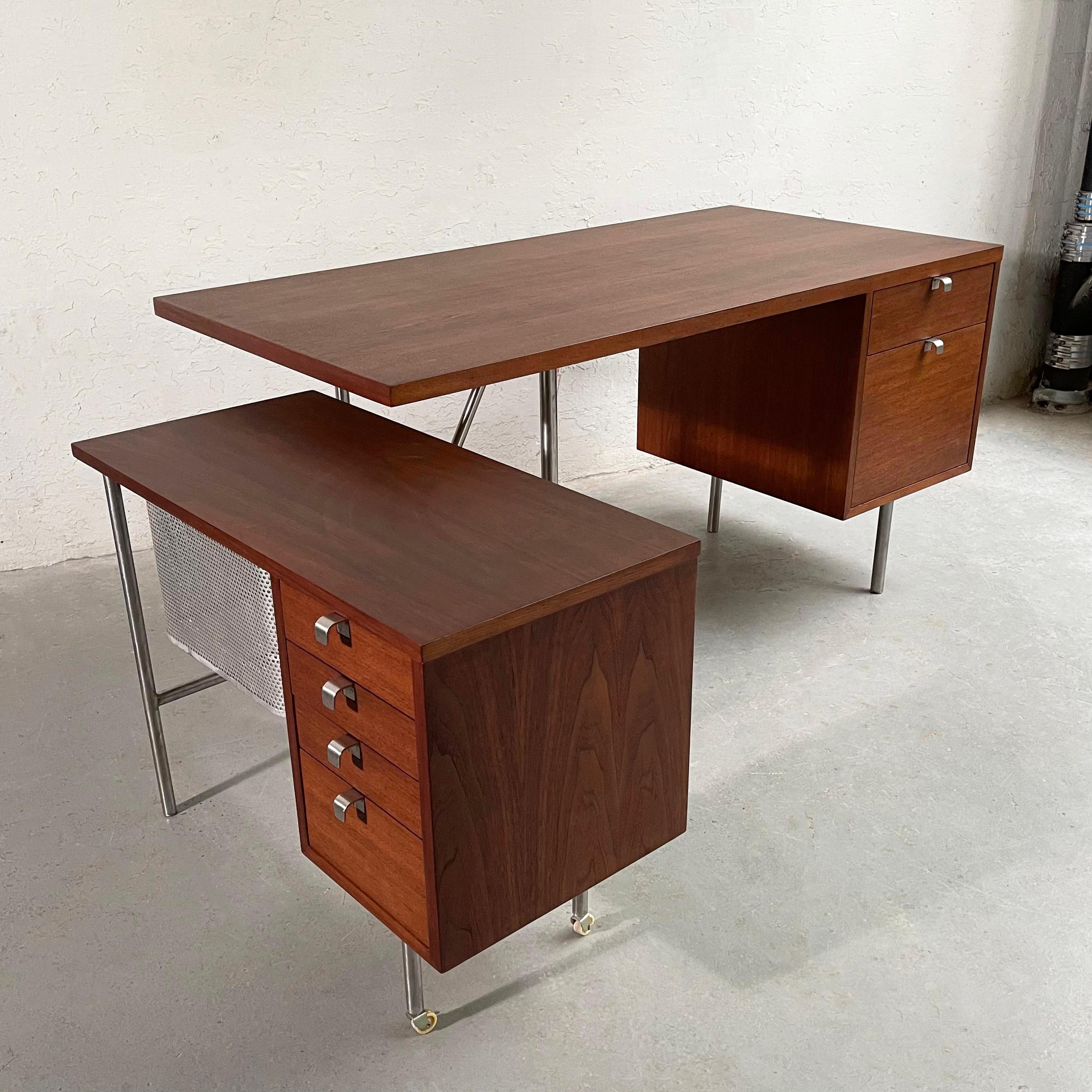 Mid-Century Modern, Executive Office Group desk model 9959 and typewriter return desk model 4751 by George Nelson for Herman Miller features a dark walnut finish with steel legs, aluminum J pulls and pull-out mesh file folder basket. The chair