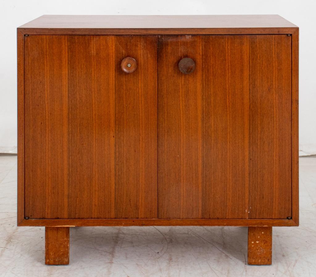 George Nelson (American, 1908-1986) for Herman Miller Walnut Two Door Cabinet, with one interior shelf on four feet, apparently marked. 30
