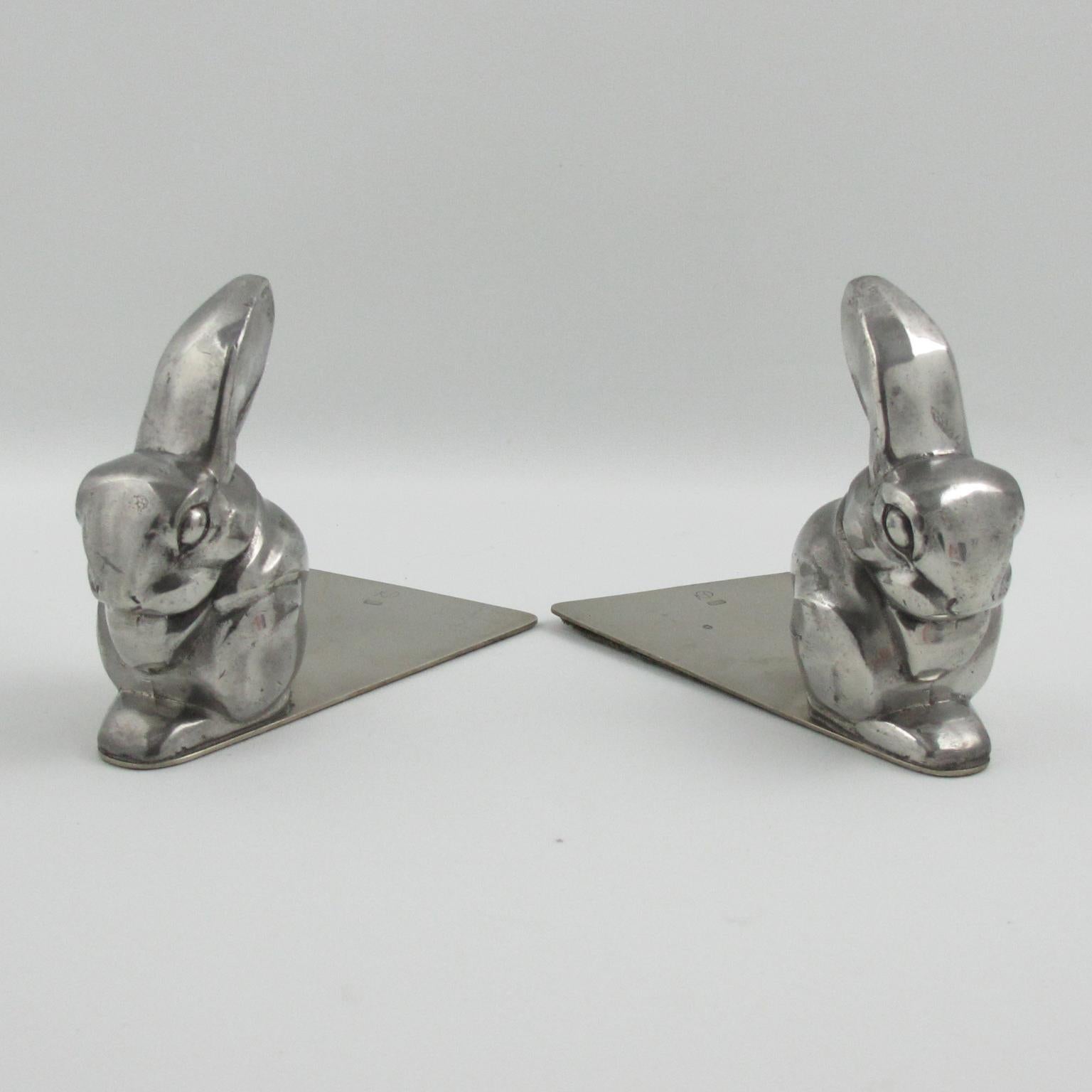 These lovely Art Deco bookends were designed by George Nilsson (1888-1975) for Gero, Netherlands. The cute rabbit shape is made of chromed metal with a long plate. The bookends are engraved with the 