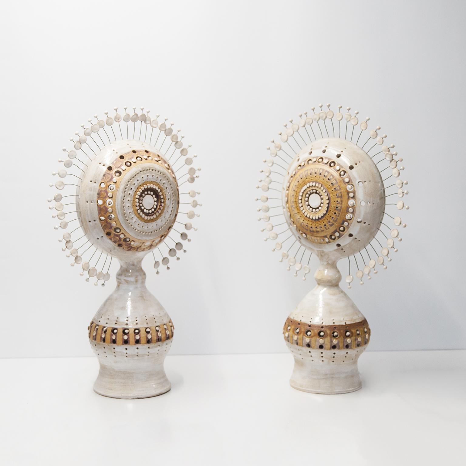 Huge table lamp Soleil Sun designed by the Belgian artist Georges Pelletier in France, 1970s. Handmade in white enamelled ceramic with golden and brown glaze and over 50 rods with round ceramic ends, two E27 sockets inside. Very good vintage