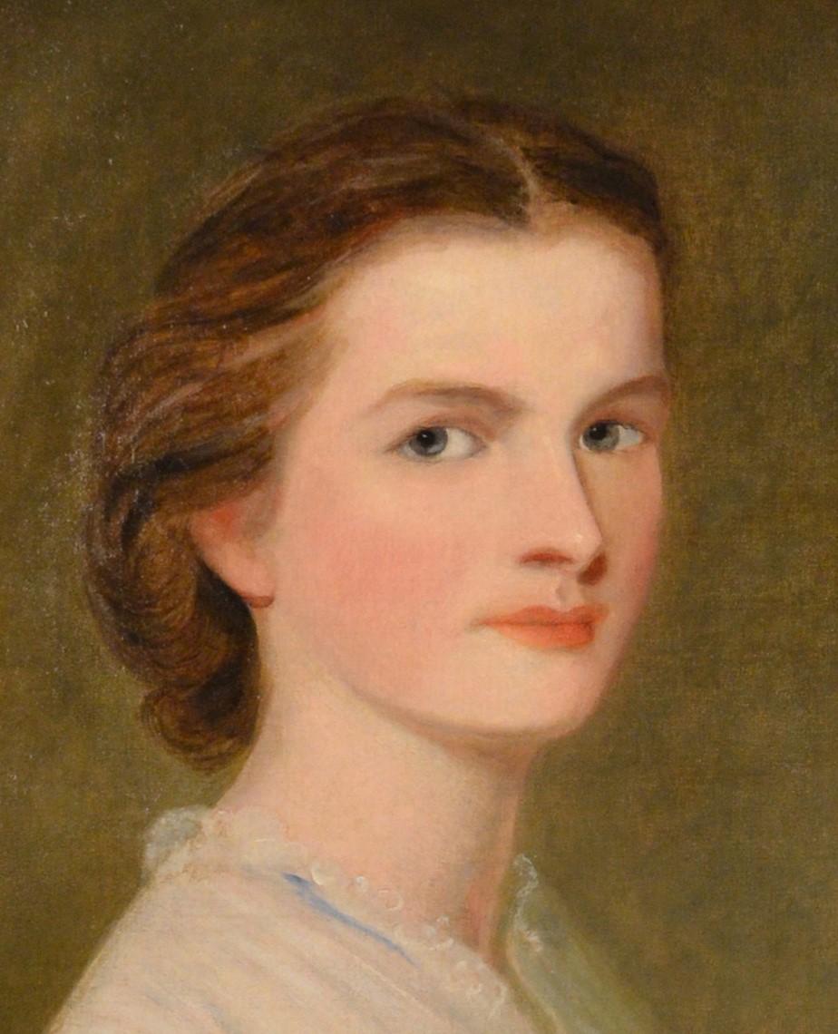 portrait of young woman in white