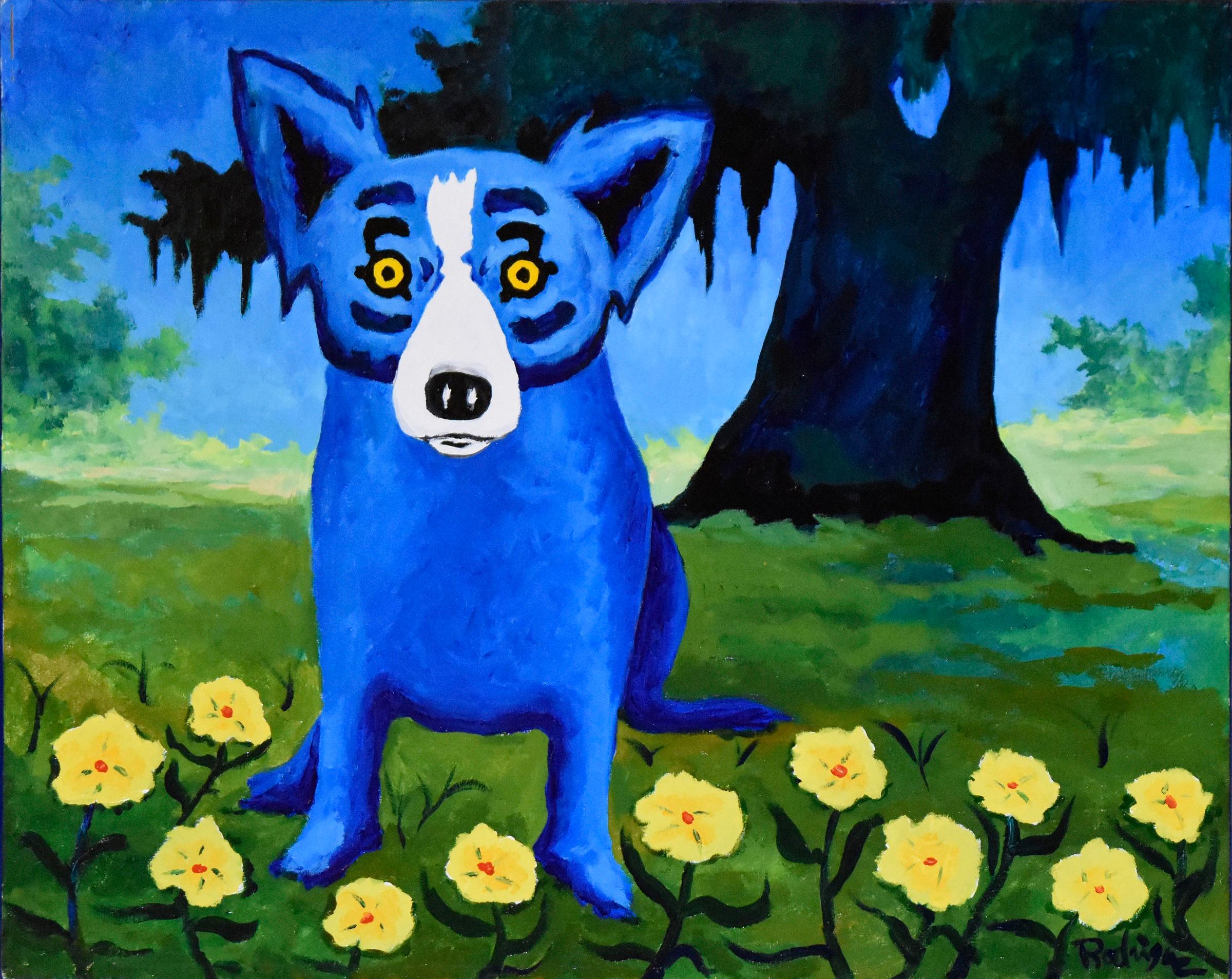 This Blue Dog work consists of a scenic background of sky, earth and trees with a large dark leafy tree and yellow flowers at the feet of a single blue dog.  The dog has soulful yellow eyes.  This pop art animal original oil on canvas painting is