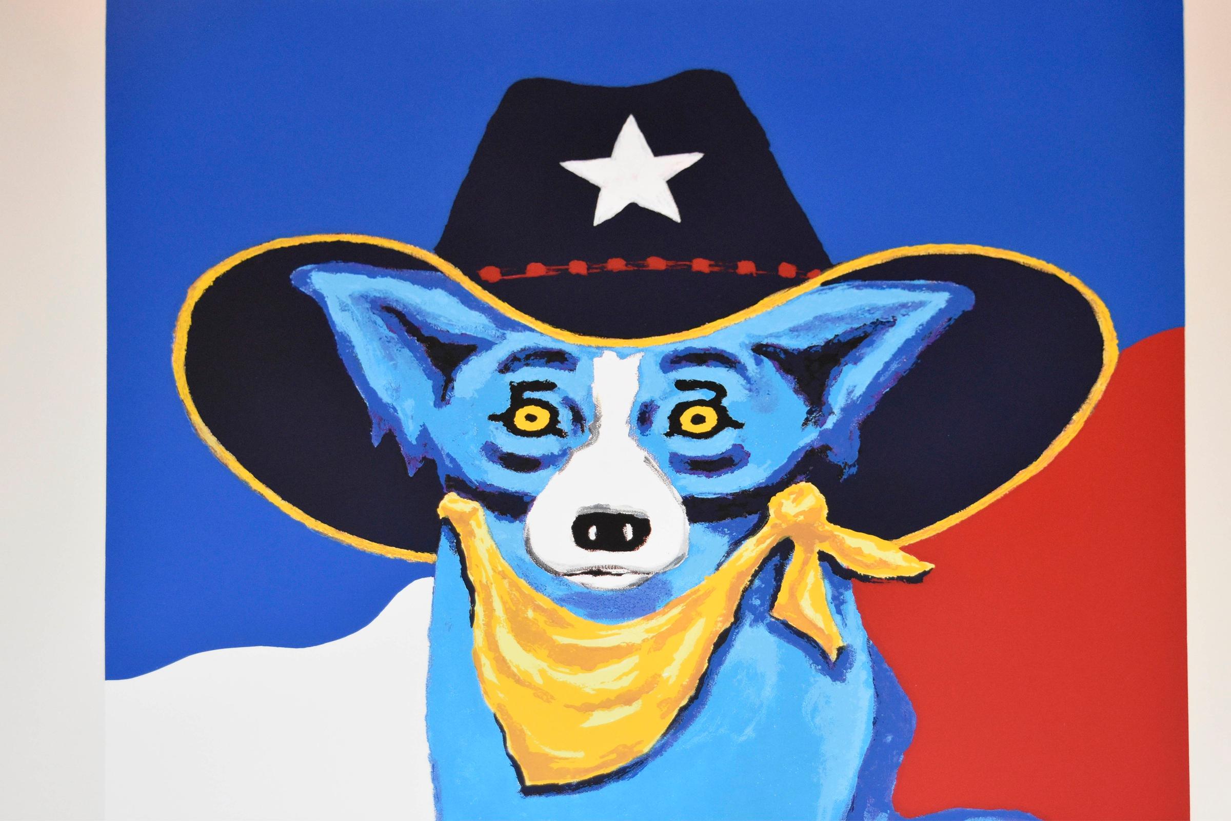 This Blue Dog work consists of a blue dog in the middle of a red, white, and blue background. The dog is wearing a yellow neckerchief and a large black western hat with gold trim on the brim, a white star, and red dots on the hat’s crown. The dog