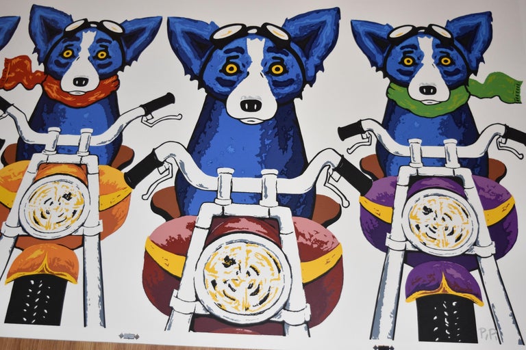 This Blue Dog work consists of 4 dogs riding on motorcycles on a white background.  Three of the 4 dogs are wearing different colored neck scarves (yellow, red, green).  All dogs are riding different colored motorcycles (green, orange, red, purple)