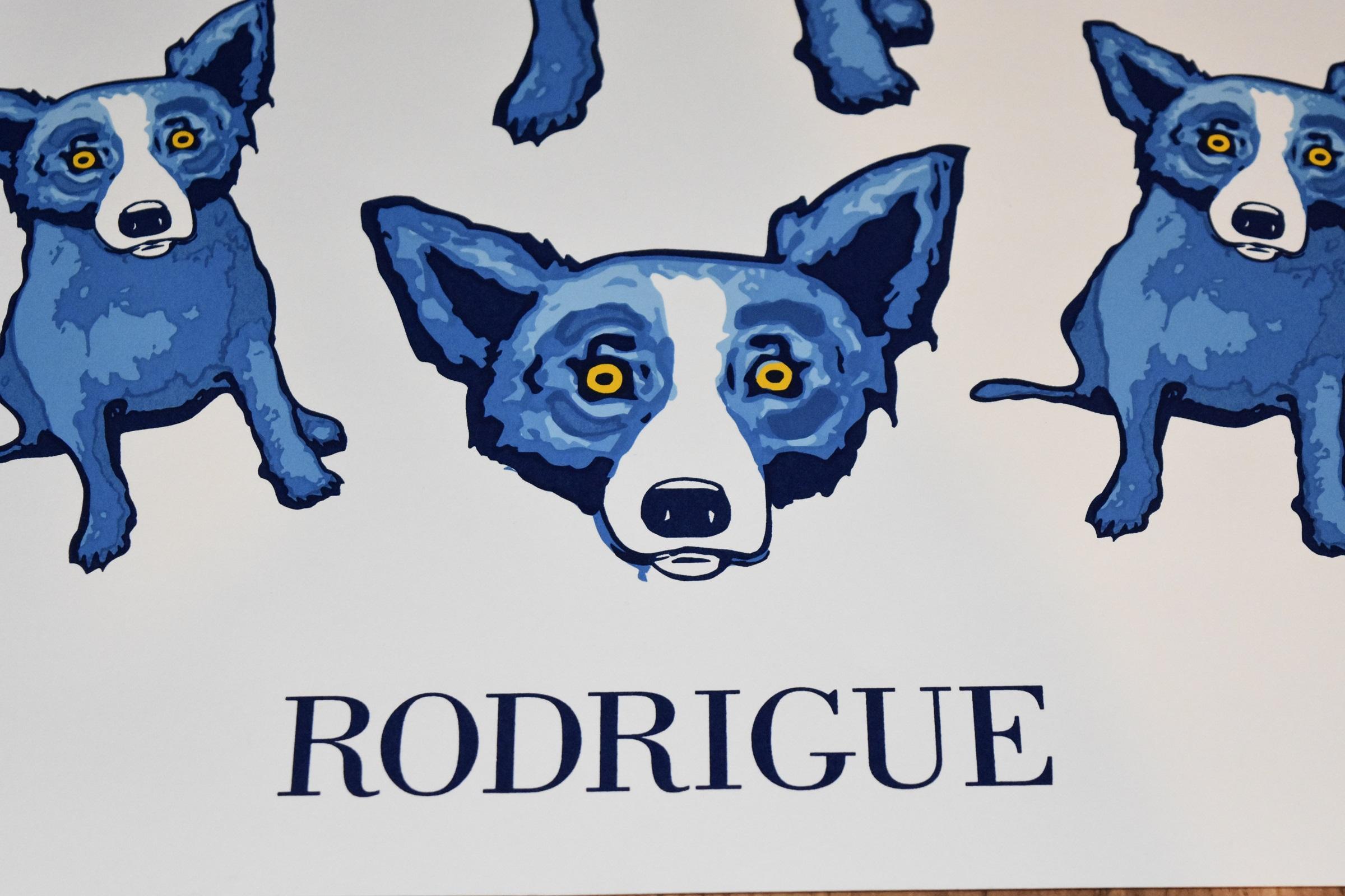 Cette œuvre intitulée Blue Dog se compose d'un fond blanc avec un chien bleu entouré de différents degrés de têtes de chiens bleus et d'un seul chien au centre.  La mention 