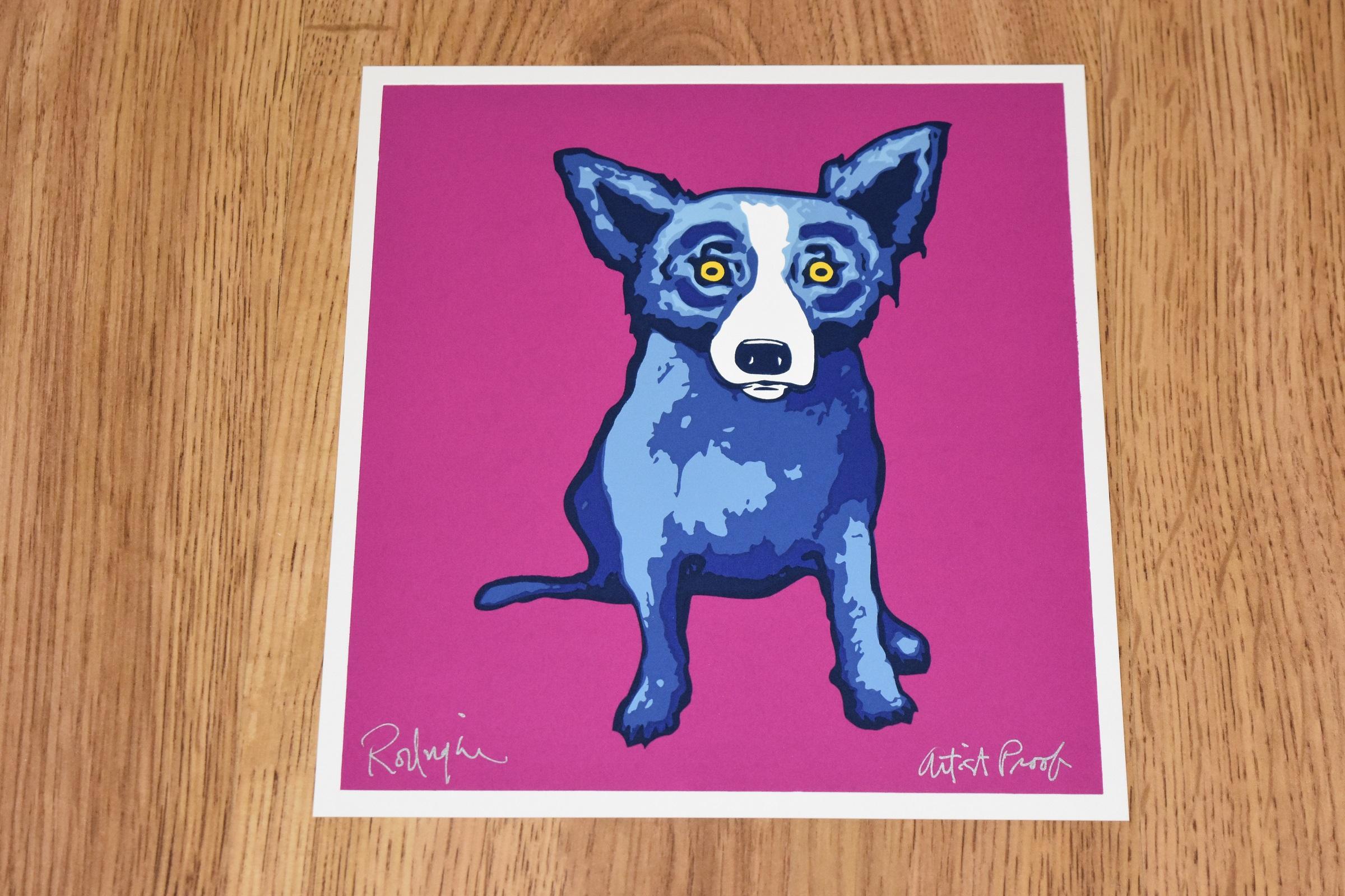 Artist:  George Rodrigue
Title:  Blue Dog “Li’l Blue Dog - Magenta”
Medium:  Silkscreen	
Date:  1998
Edition:  Artist Proof
Dimensions:  10 X 9”
Description:  Signed & Framed
Condition:  Excellent 
