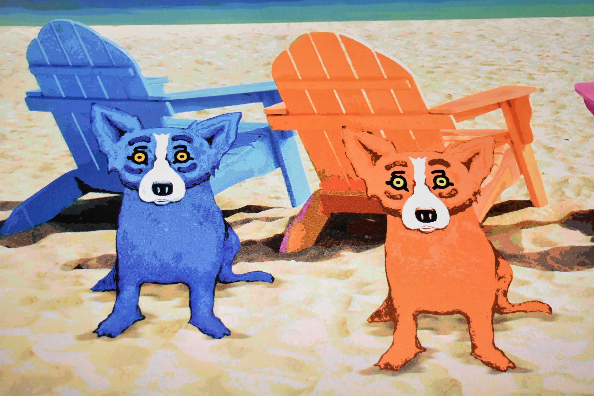 This Blue Dog work consists of 4 Adirondack beach chairs, 1 each of Green, Pink, Orange and Blue on a beach in the lower background.  The sea and sky are in the upper background.  There are 4 dogs, 1 each of Green, Pink, Orange and Blue, each one