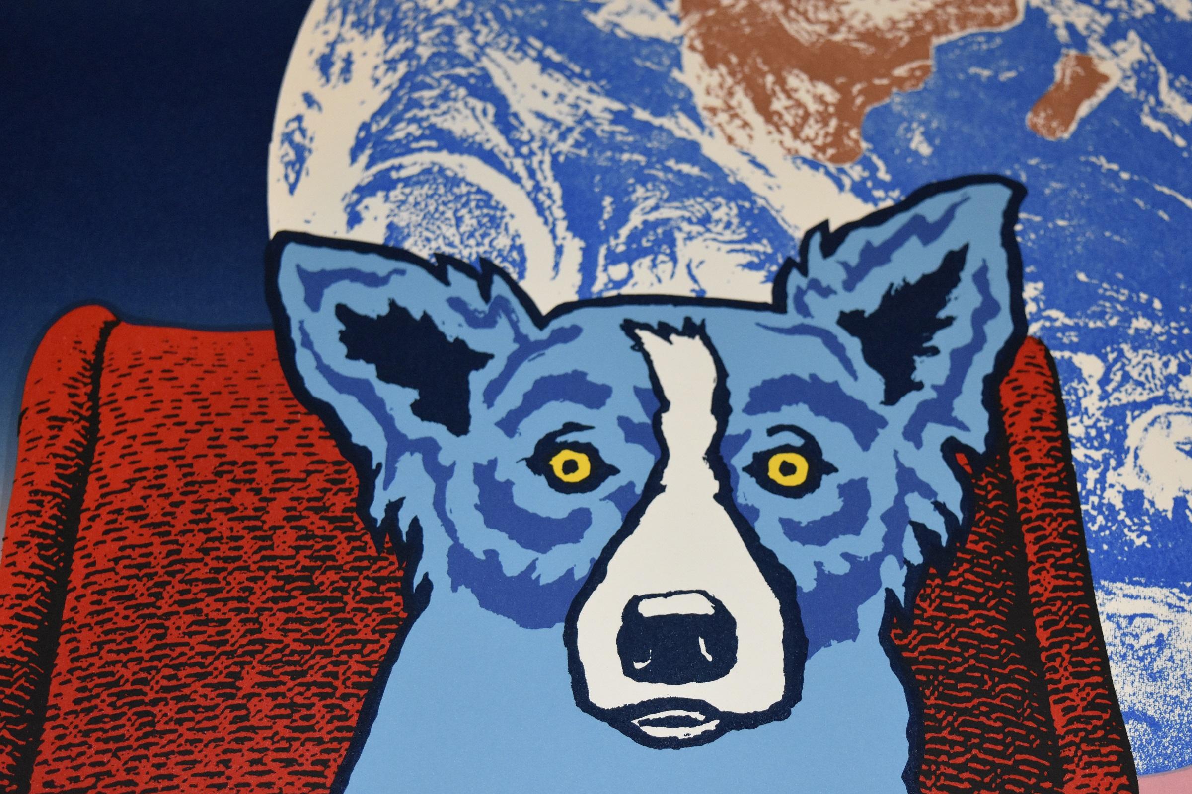 This Blue Dog work consists of a dark blue fading into 2 shades of pink background and a dog sitting on a dark red chair in front of earth.  The dog has soulful yellow eyes.  This pop art animal original silkscreen print on paper is guaranteed