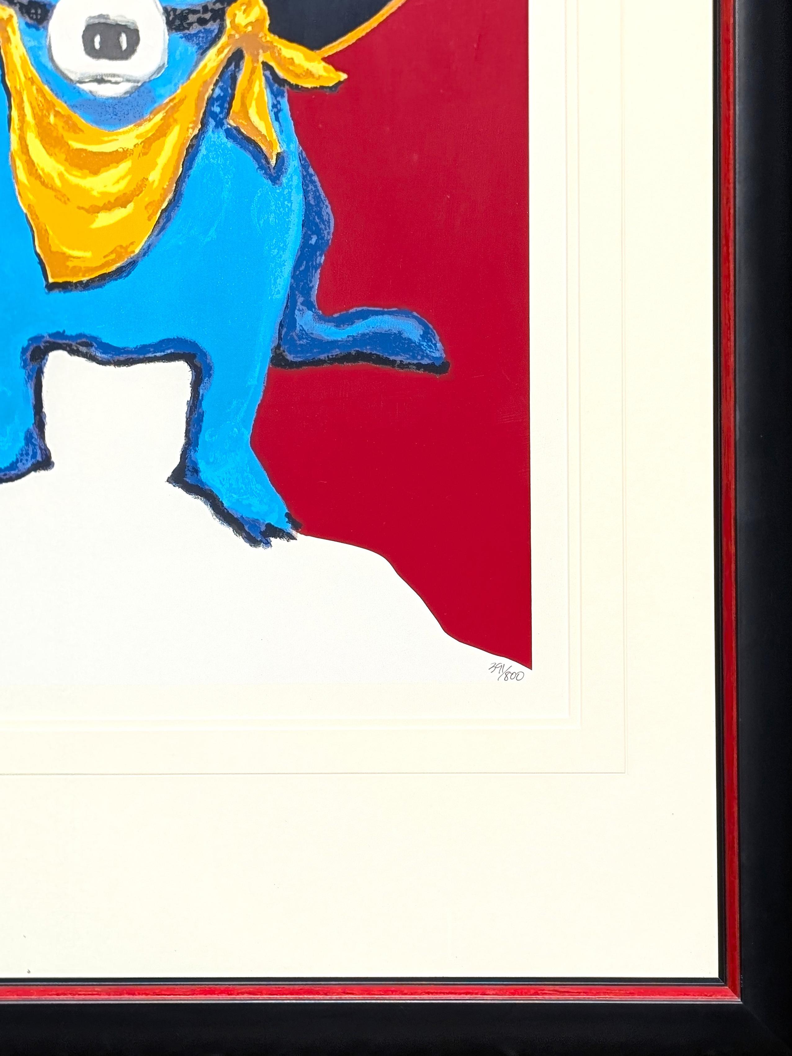 Serigrafia colorata contemporanea dell'artista George Rodrigue, nato in Louisiana. L'opera presenta l'iconico cane blu di Rodrigues, vestito con una bandana gialla e un cappello da cowboy con una bandiera del Texas. L'opera è firmata ed edita lungo