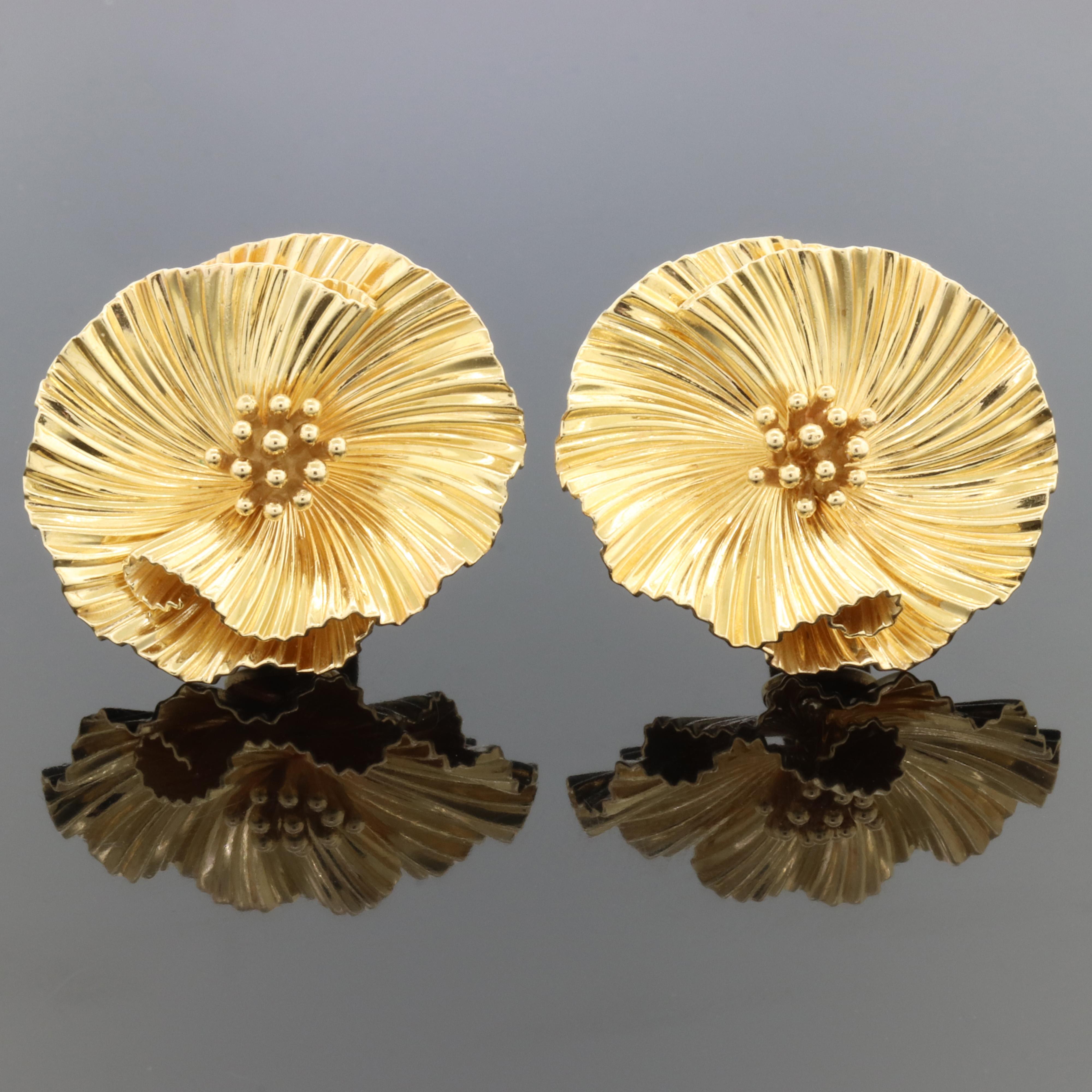 Iconic and stylish pair of  George Schuler yellow gold flower clip on earrings
These yellow gold ruffled flower clip earrings are very high quality throughout, as all of Shuler's items were. They feature the extremely comfortable 1947 patented clip