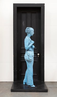 Blue Girl in Front of Black Door