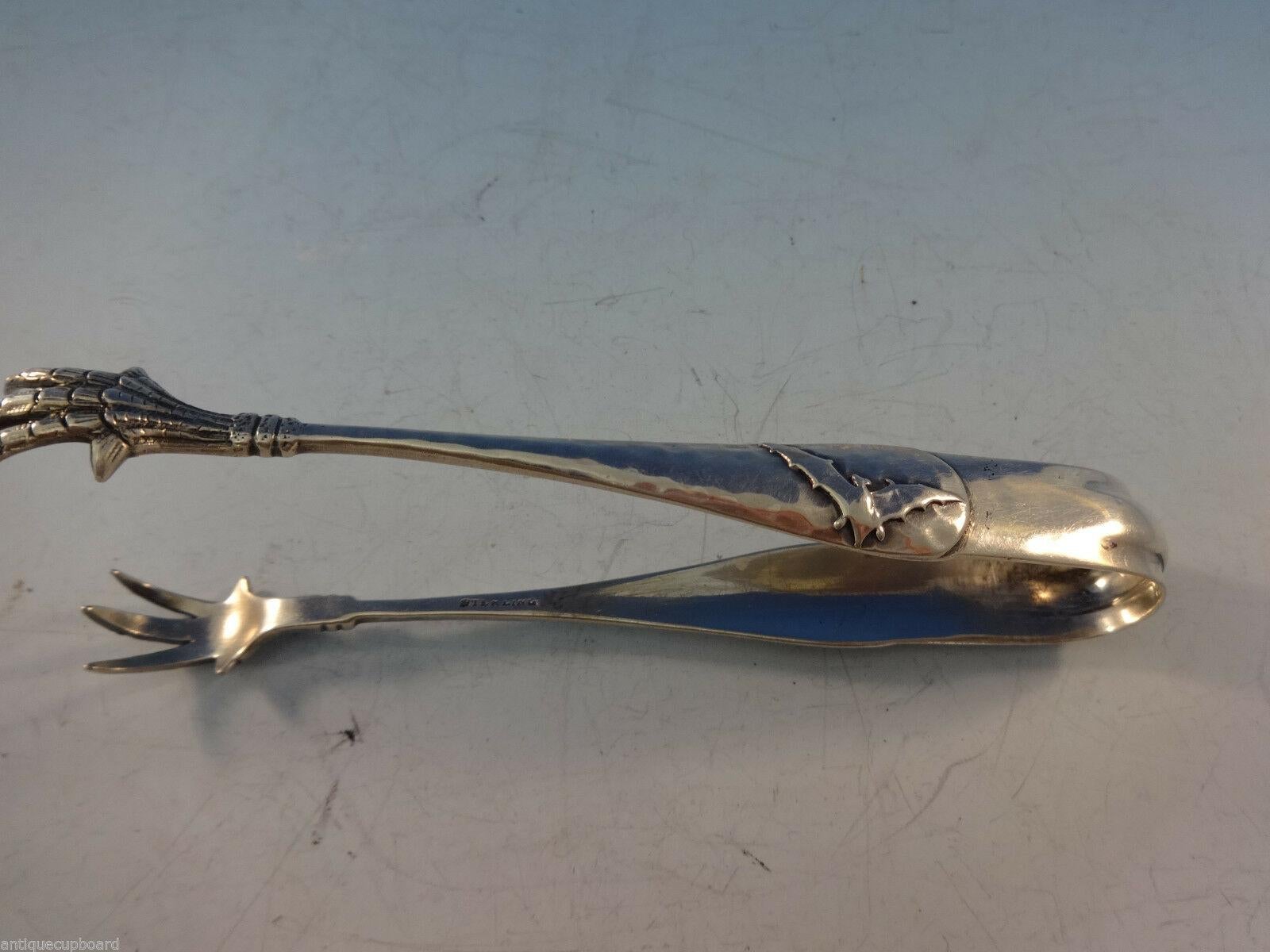Sterling silver

George Shiebler sterling large sugar tong with applied butterfly on one side and applied bat on the other side measures 5 1/4, circa 1890s. It is in excellent condition. Unusual motifs!

Satisfaction guaranteed!