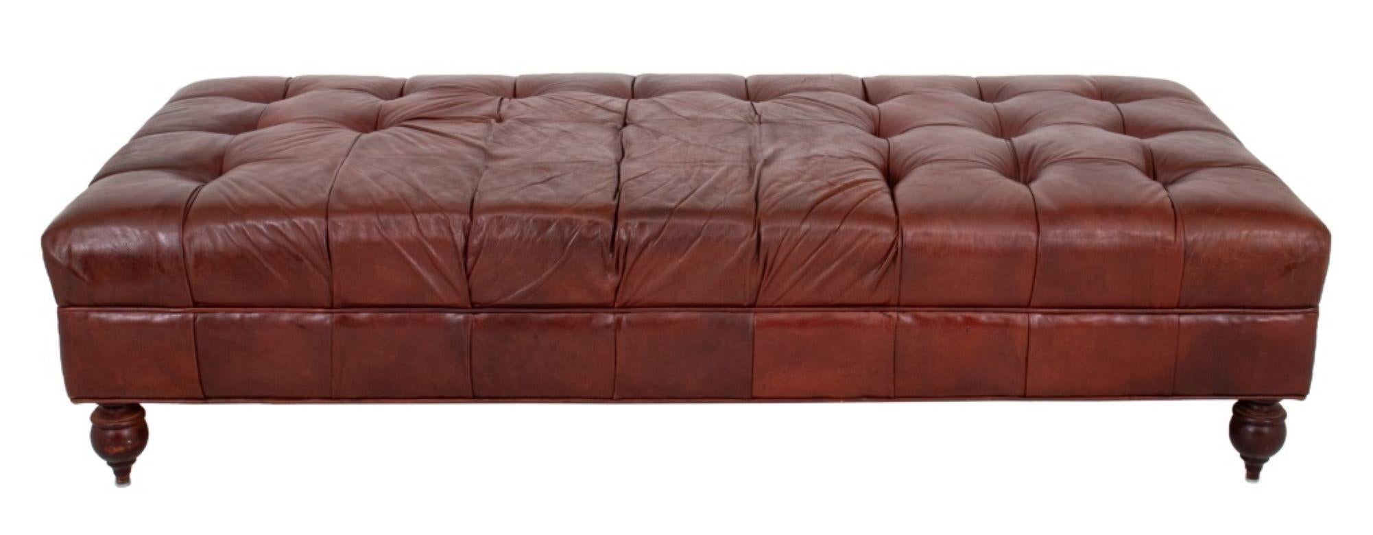 George Smith Attributed Chesterfield Style Brown Tufted Leather Bench, raised on turned wood feet. Some wear to upholstery. Some buttons require retufting 