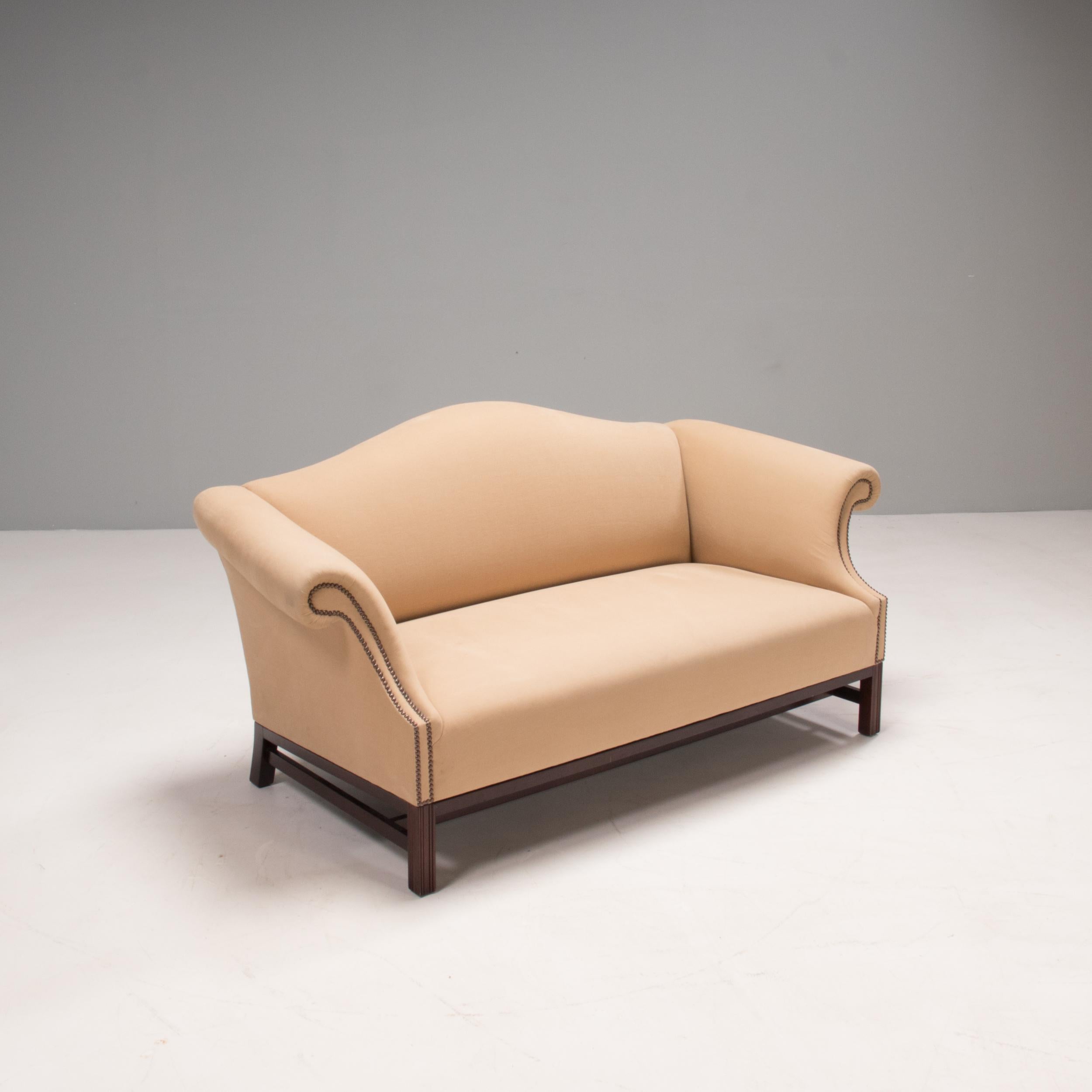 Designed and manufactured in the UK, using traditional techniques this Chippendale sofa by George Smith combines classic design with modern comfort.

Named after the designer Thomas Chippendale, this 2 seat sofa is an homage to his iconic style.