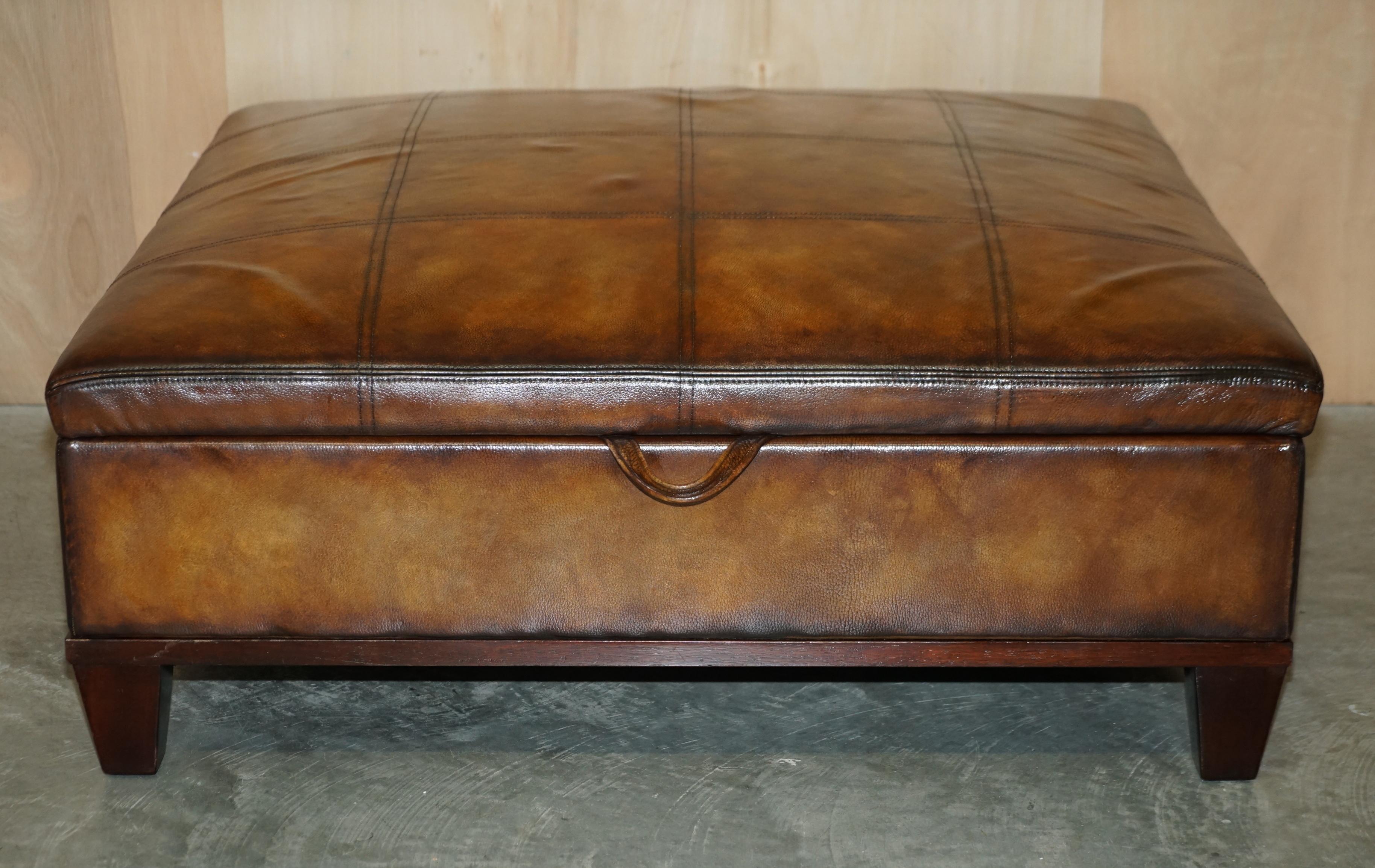We are delighted to offer for sale this extra large fully restored hand made in Chelsea George Smith brown leather hearth ottoman footstool / coffee table with large amounts of internal storage.

A very good looking collectable and rare stool, I