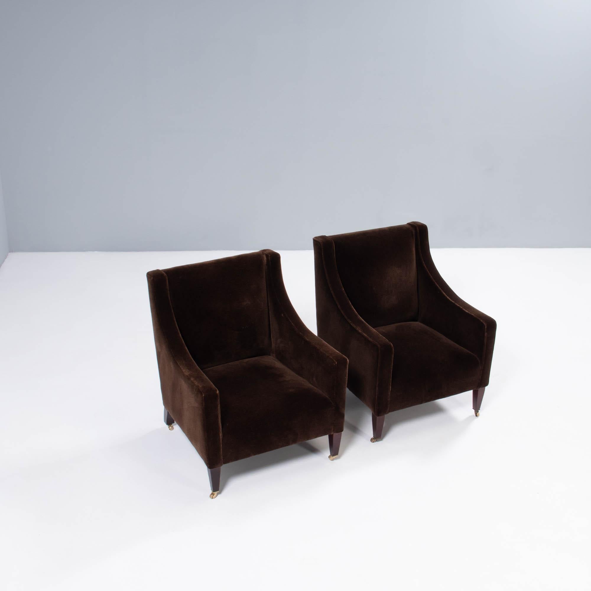 Designed and manufactured in the UK, using traditional techniques this Georgian armchair by George Smith combines classic design with modern comfort.

The chair has a fixed seat and is fully upholstered in brown velvet. The solid wooden legs are