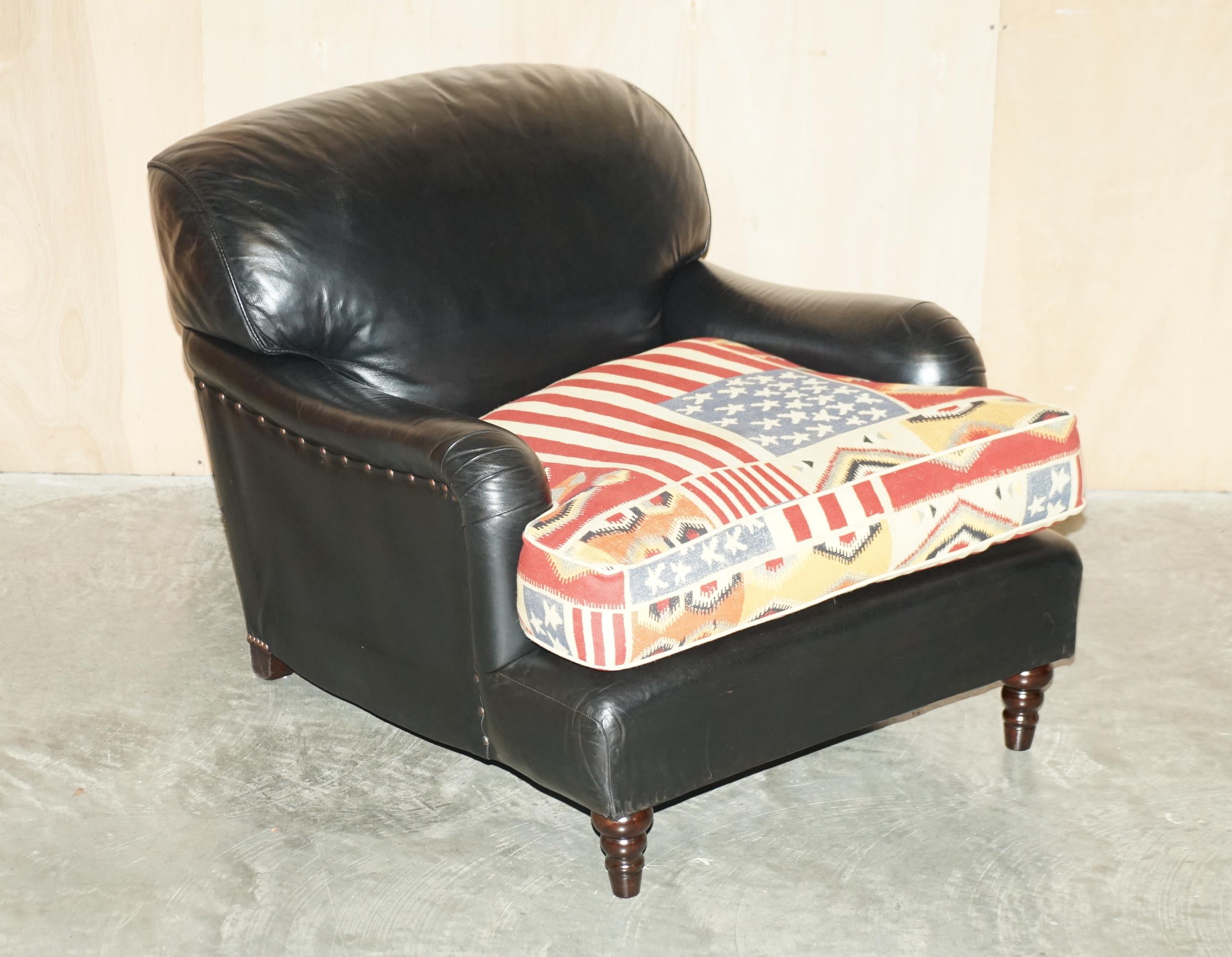 We are delighted to offer for sale this hand made in England, George Smith Signature Standard arm style armchair with American flag Kilim seat cushion and black leather upholstery.

A very good looking well made armchair, based on the original