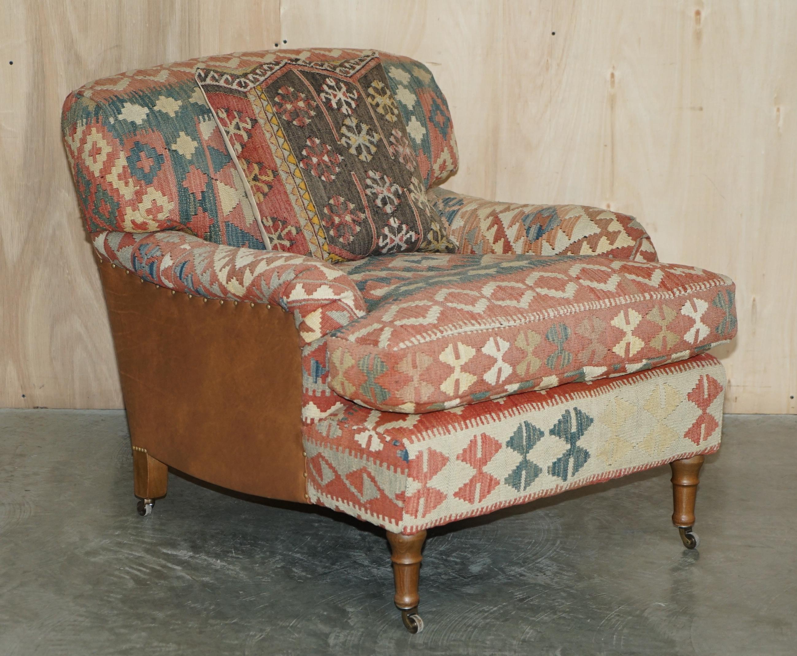 We are delighted to offer for sale this hand made in England, George Smith Signature Standard arm style, feather cushion back and base, Kilim and brown leather upholstered armchair with matching footstool / ottoman

I have the matching sofa listed