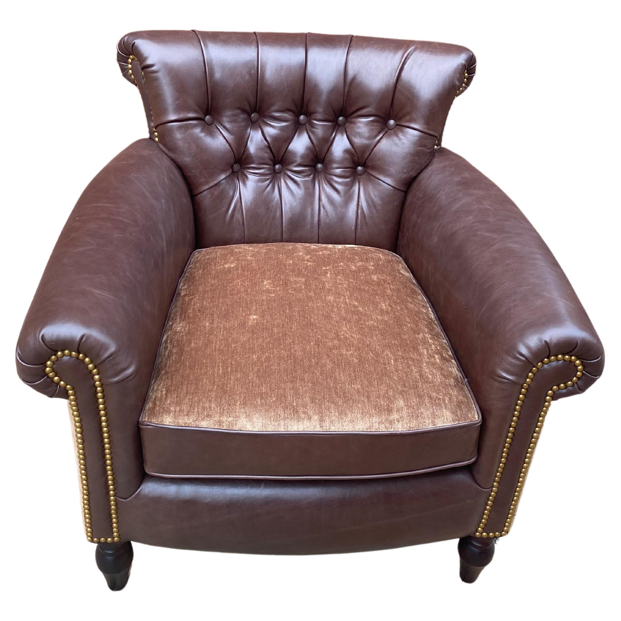 Impressive large tufted George Smith library Club chair with nailhead trim newly reupholstered in a chocolate leather on the inside back, arms, and perimeter and cording of the seat.  There's coordinating velvet mohair on the exterior back, sides
