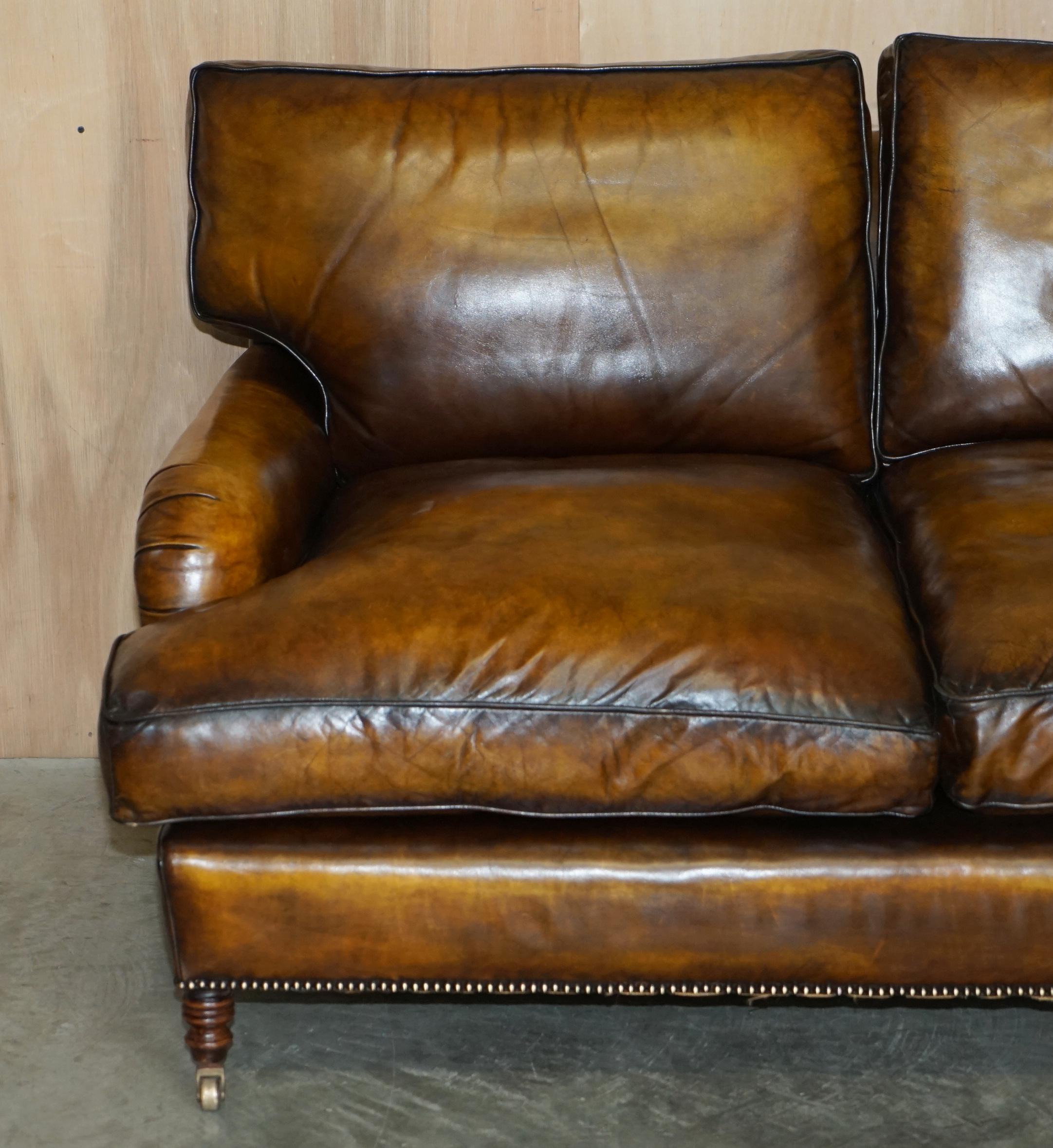 leather couch with brass tacks