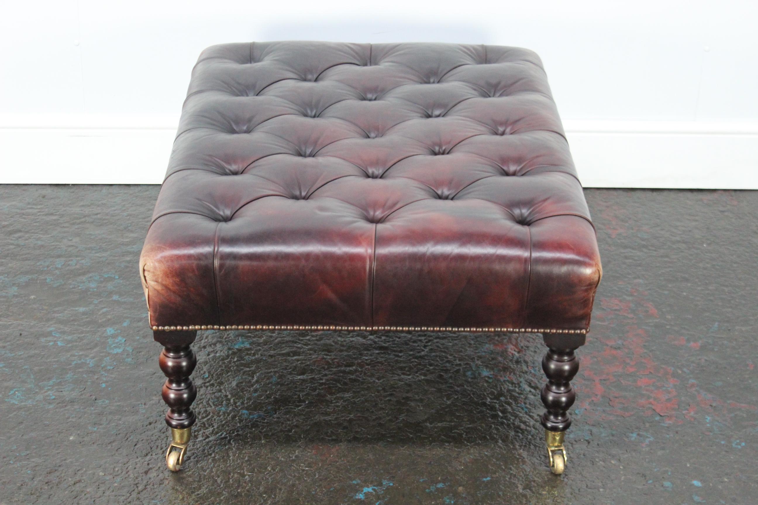 leather buttoned footstool