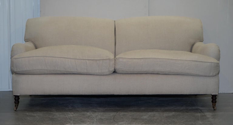 We are delighted to offer for sale this lovely George Smith Signature Scroll arm sofa RRP £11,000 upholstered in GS oatmeal cotton linen 

George Smith Chelsea make some of the finest hand made in England sofas based on traditional English