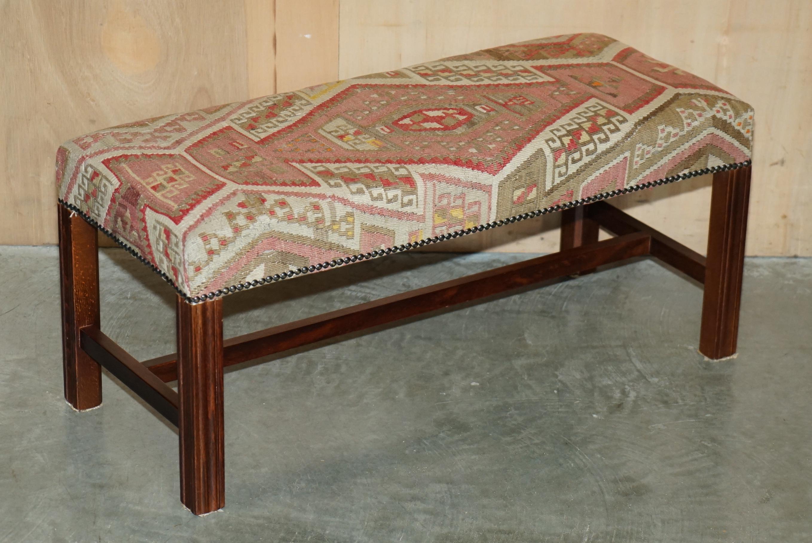 Royal House Antiques

Royal House Antiques is delighted to offer for sale this exquisite Victorian style George Smith mahogany footstool with super collectable Kilim upholstery and reeded legs 

Please note the delivery fee listed is just a guide,